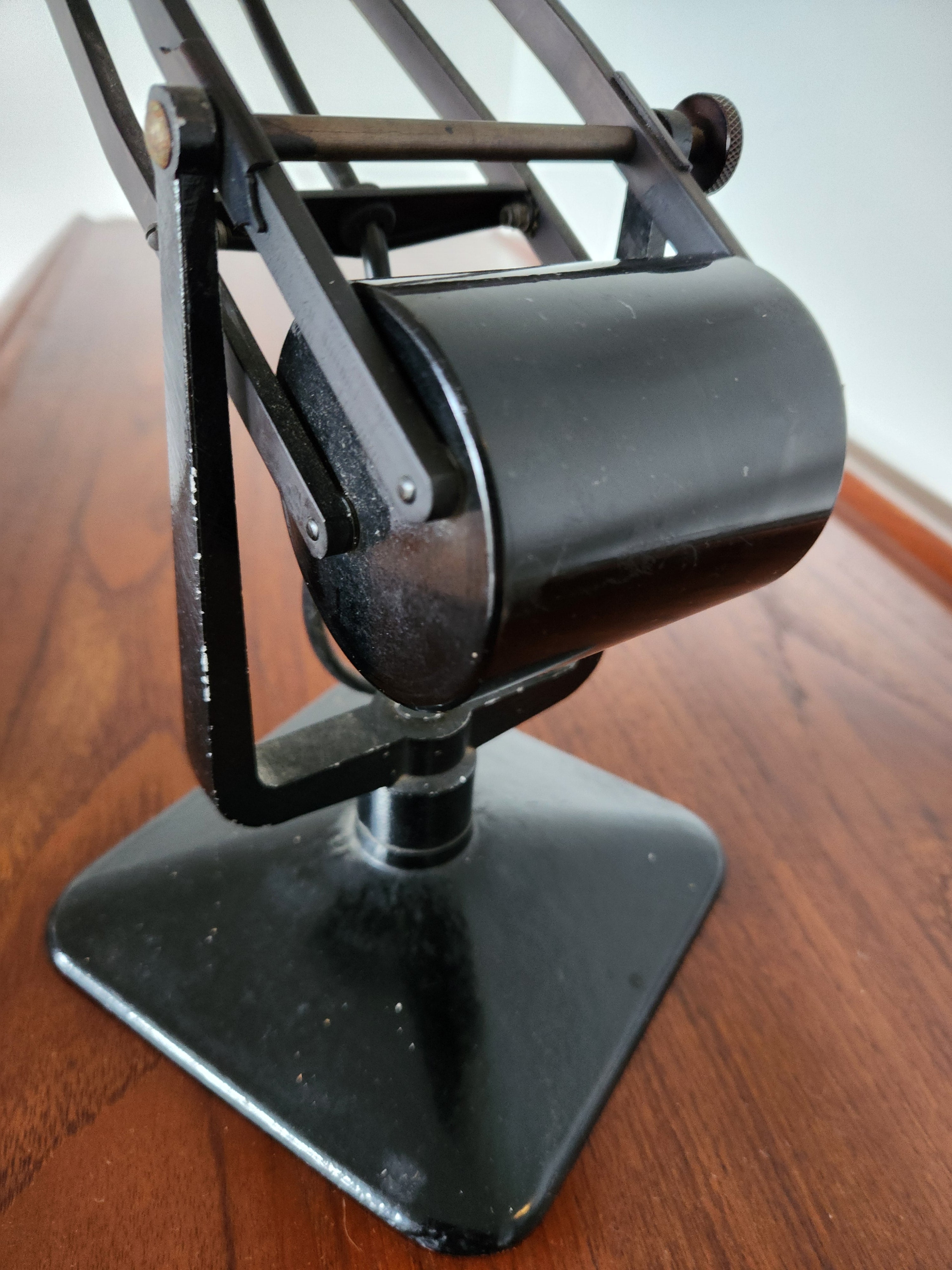 Mid Century Anglepoise lamp. close-up of counterweight mech front right facing