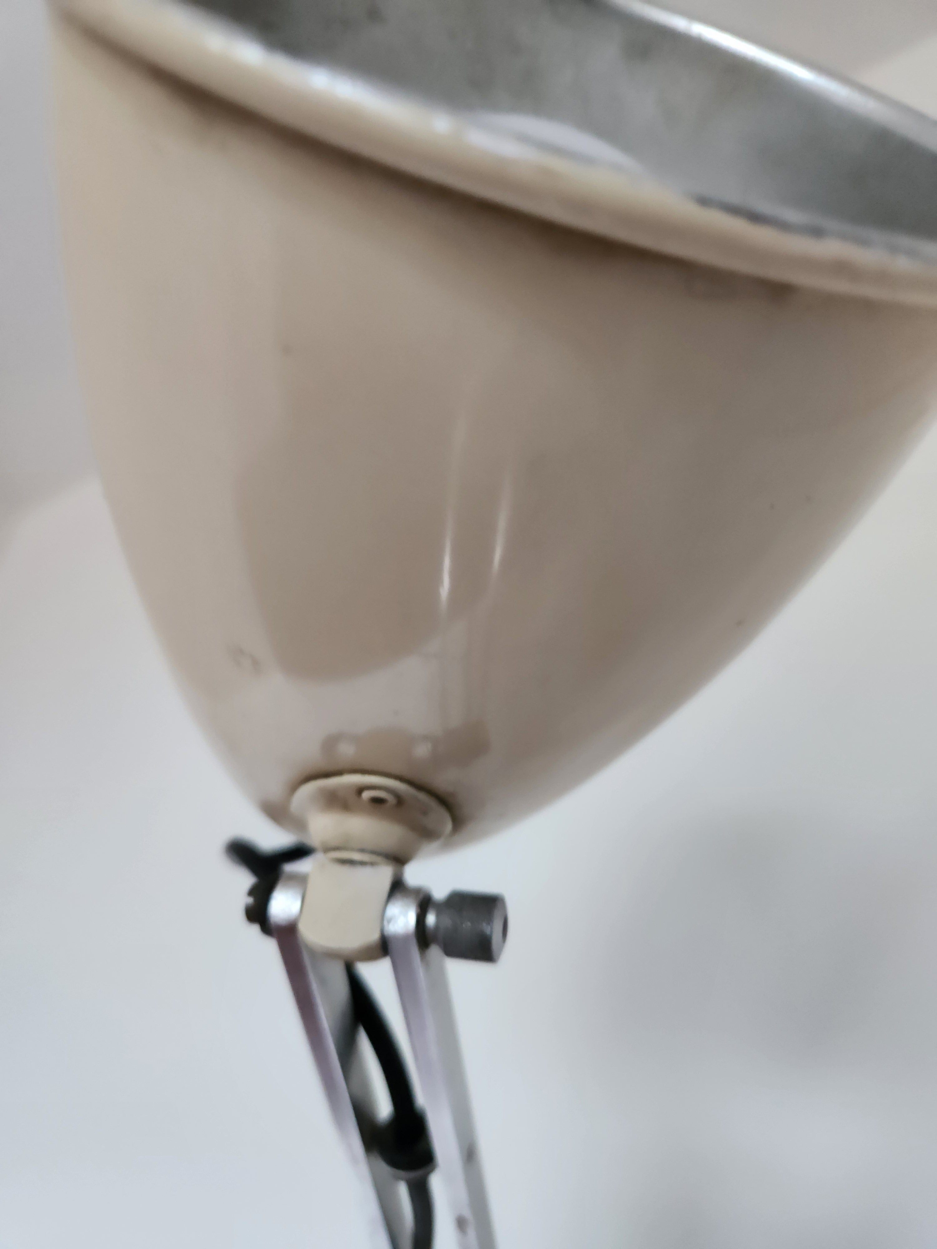 Mid Century Anglepoise lamp. close-up view of shade under-side
