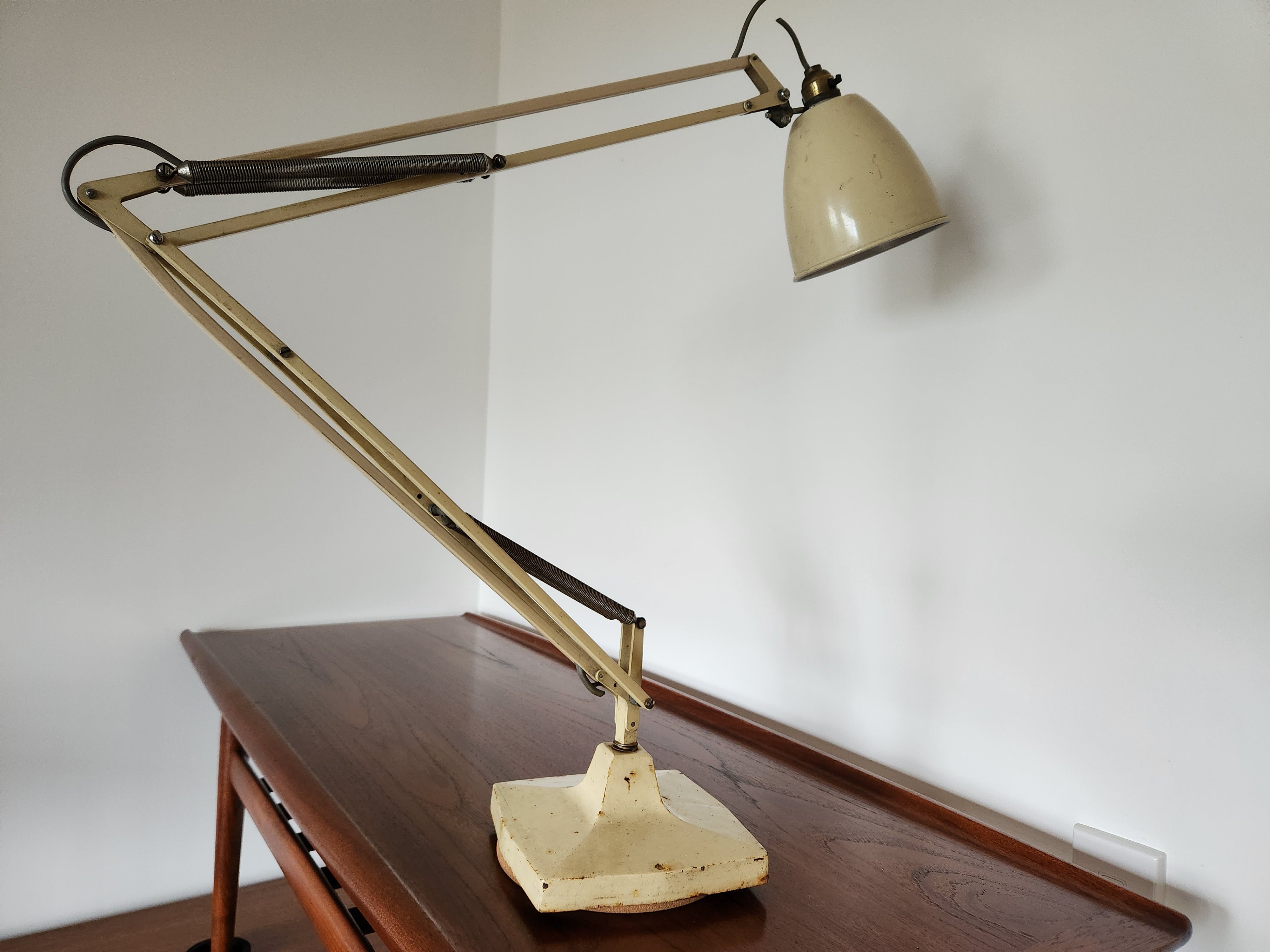 mid century anglepoise lamp. Pictorial emphasising large size of lamp side on.