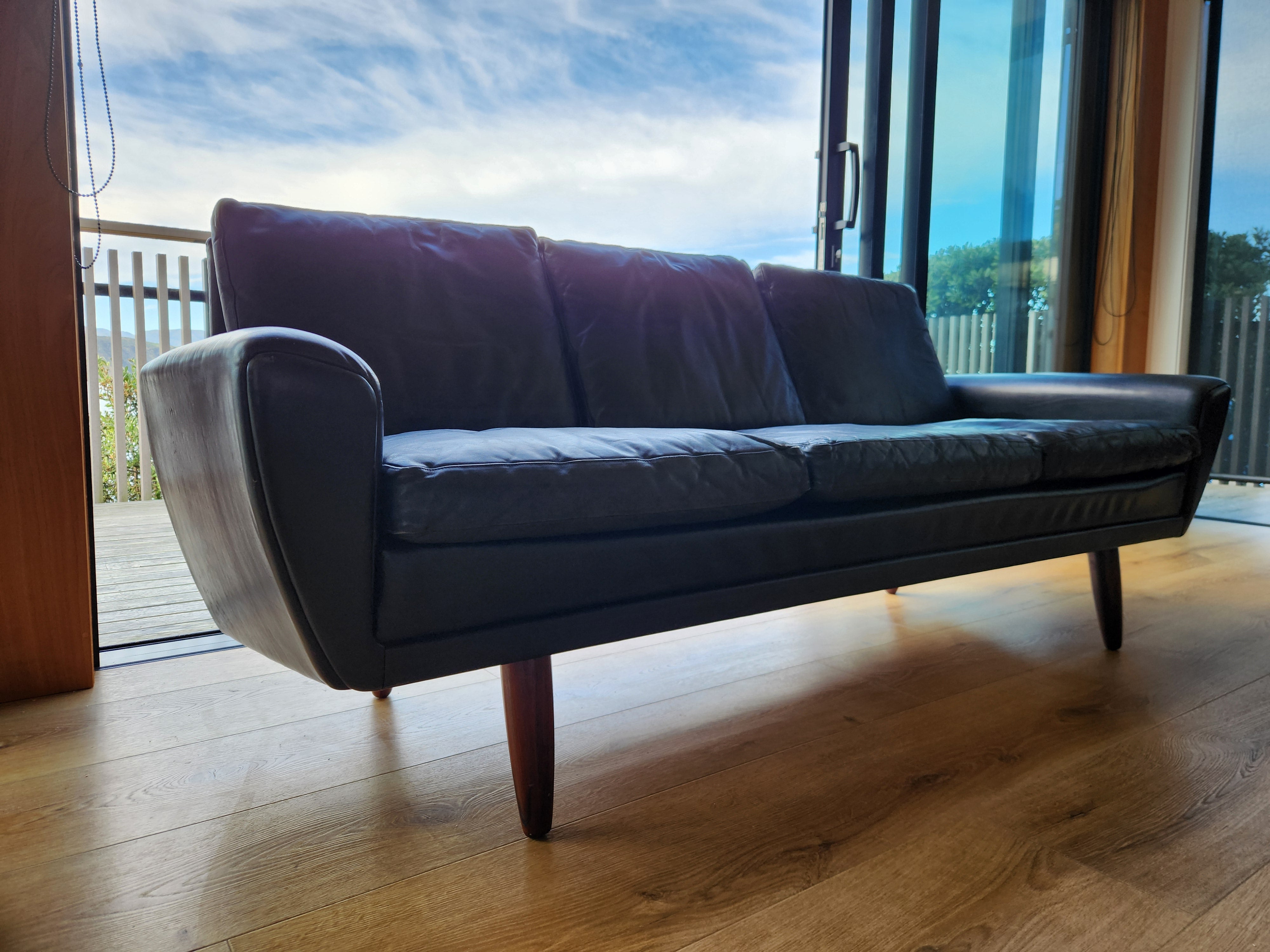 Danish mid century sofa. Showing distinctive arm detail.