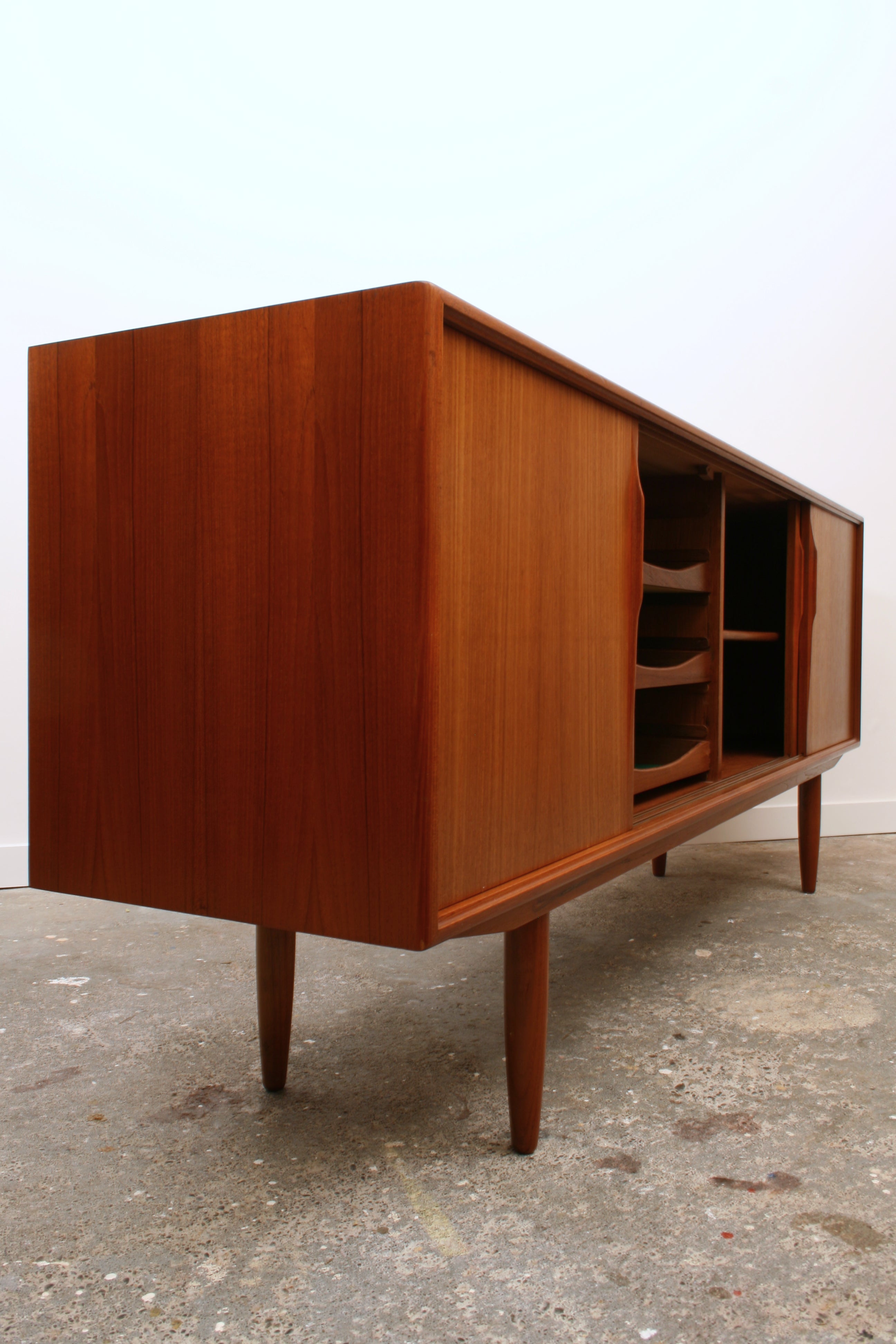 Mid century sideboard isometric central doors open showing internal drawers.