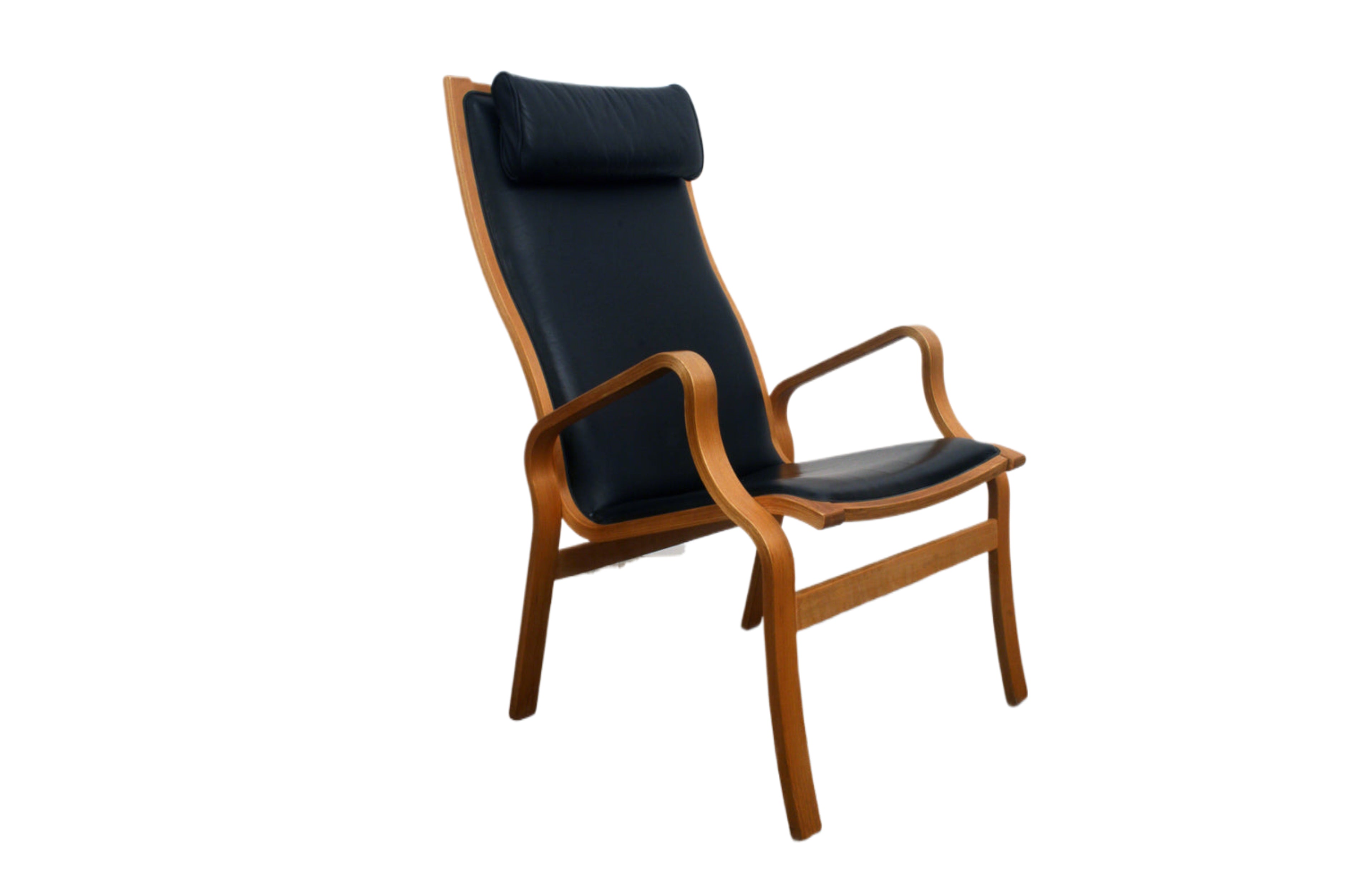 Danish Mid Century Armchair by Kurt Stovby.  'Bern' chair Made from laminated Beech. Upholstered in black vinyl with a leather headrest. 