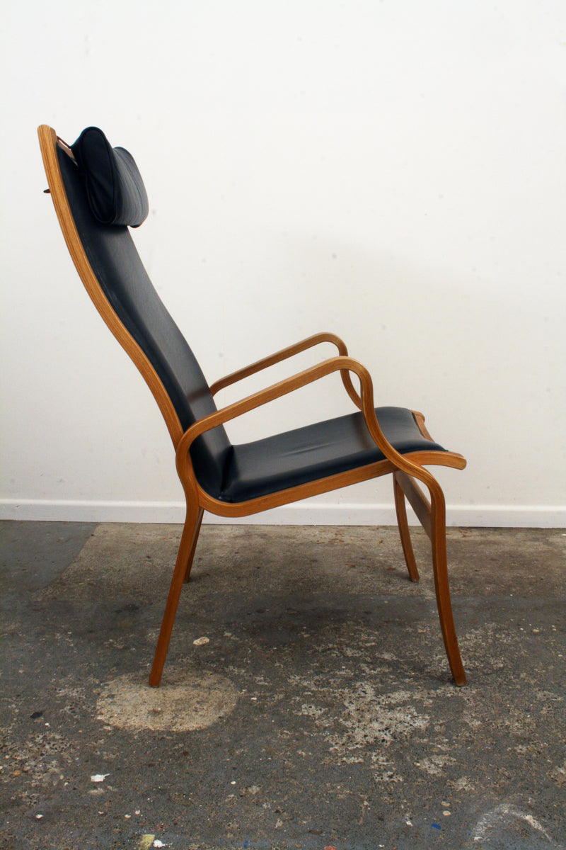 Danish Mid Century Armchair. Side view.