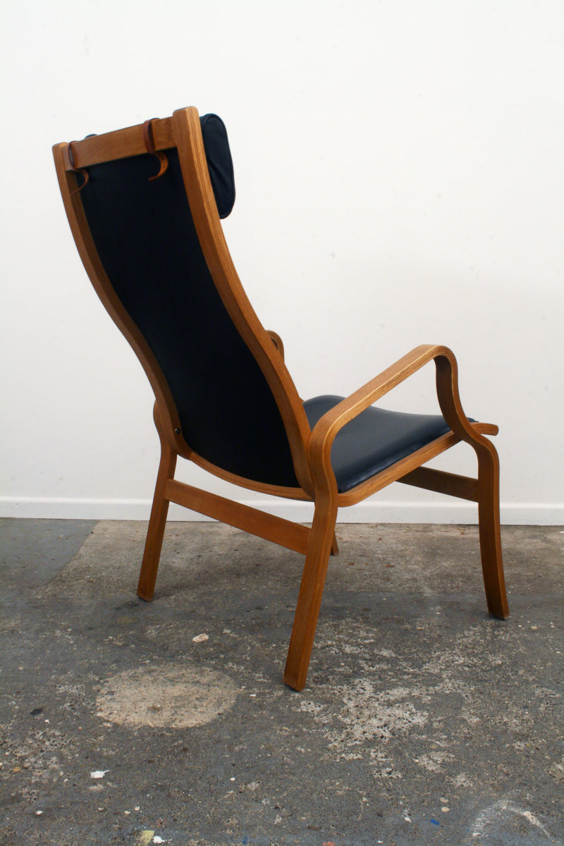 Danish Mid Century Armchair. Angular rear view.