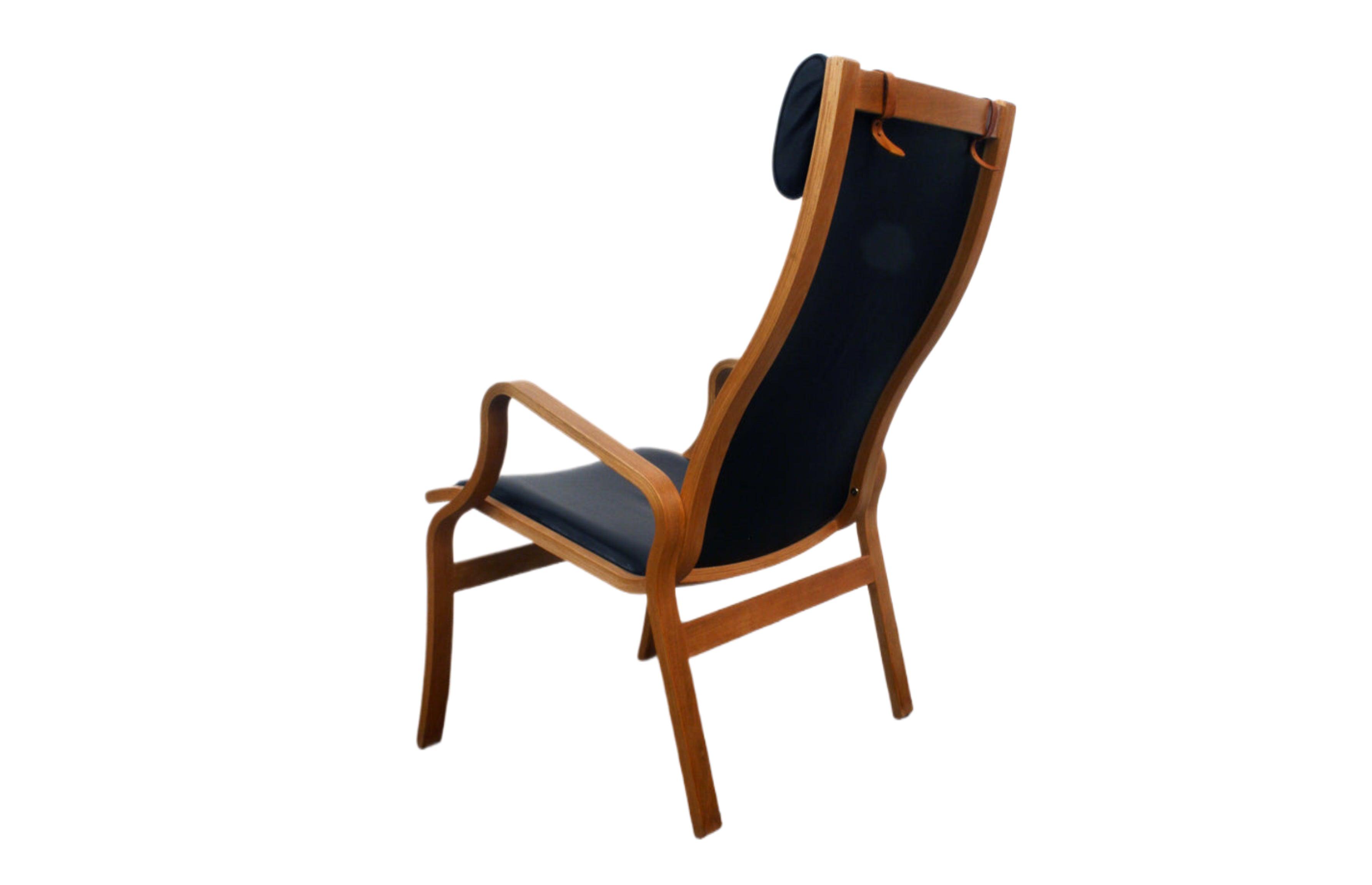 Danish Mid Century Armchair. Curved detailing.