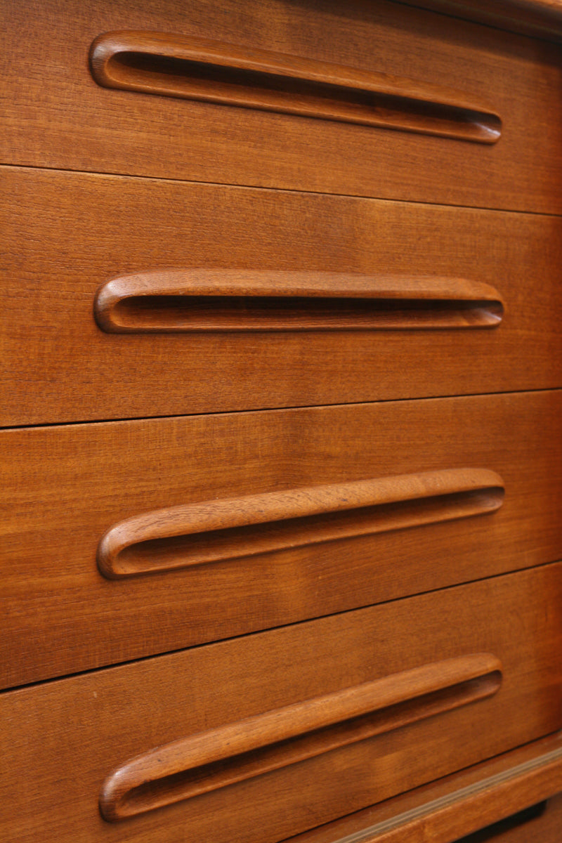 Close up of moulded handles on a mid century sideboard by Nils Jonsson for Troeds. Sideboard model Bjärnum in Teak.
