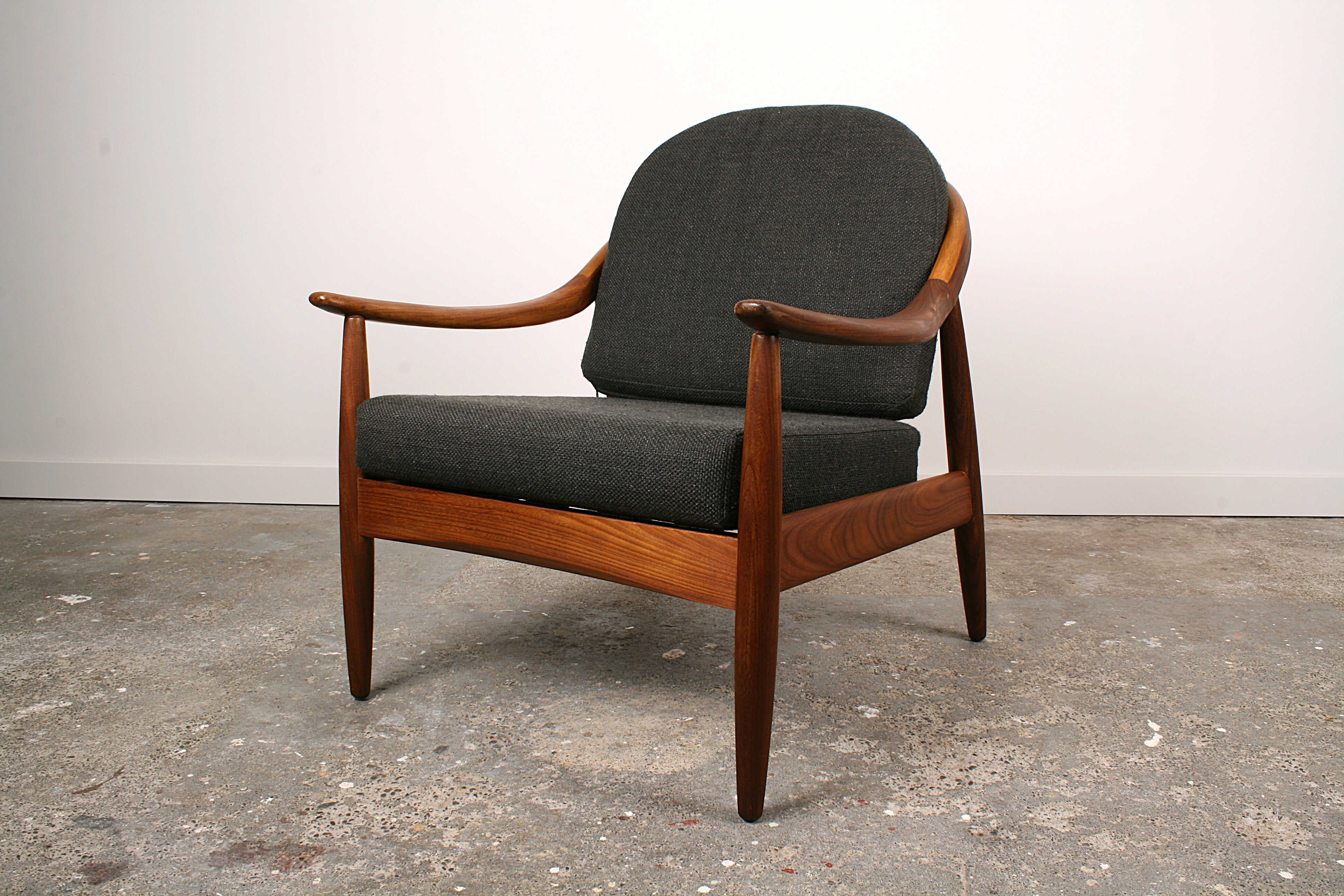 Mid Century Teak armchair with charcoal upholstery in place.