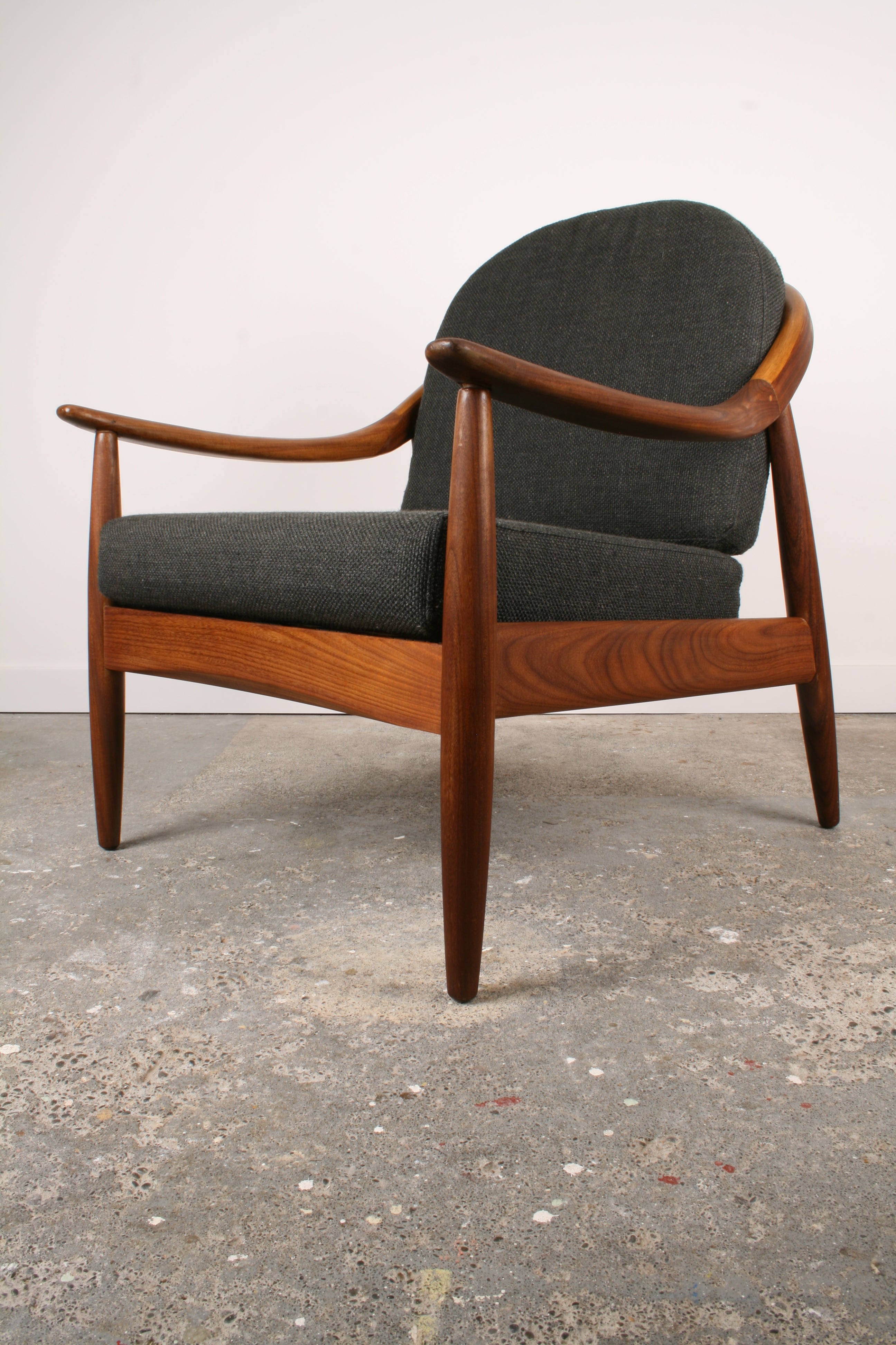 Mid Century Teak armchair. Same view with upholstery in place.