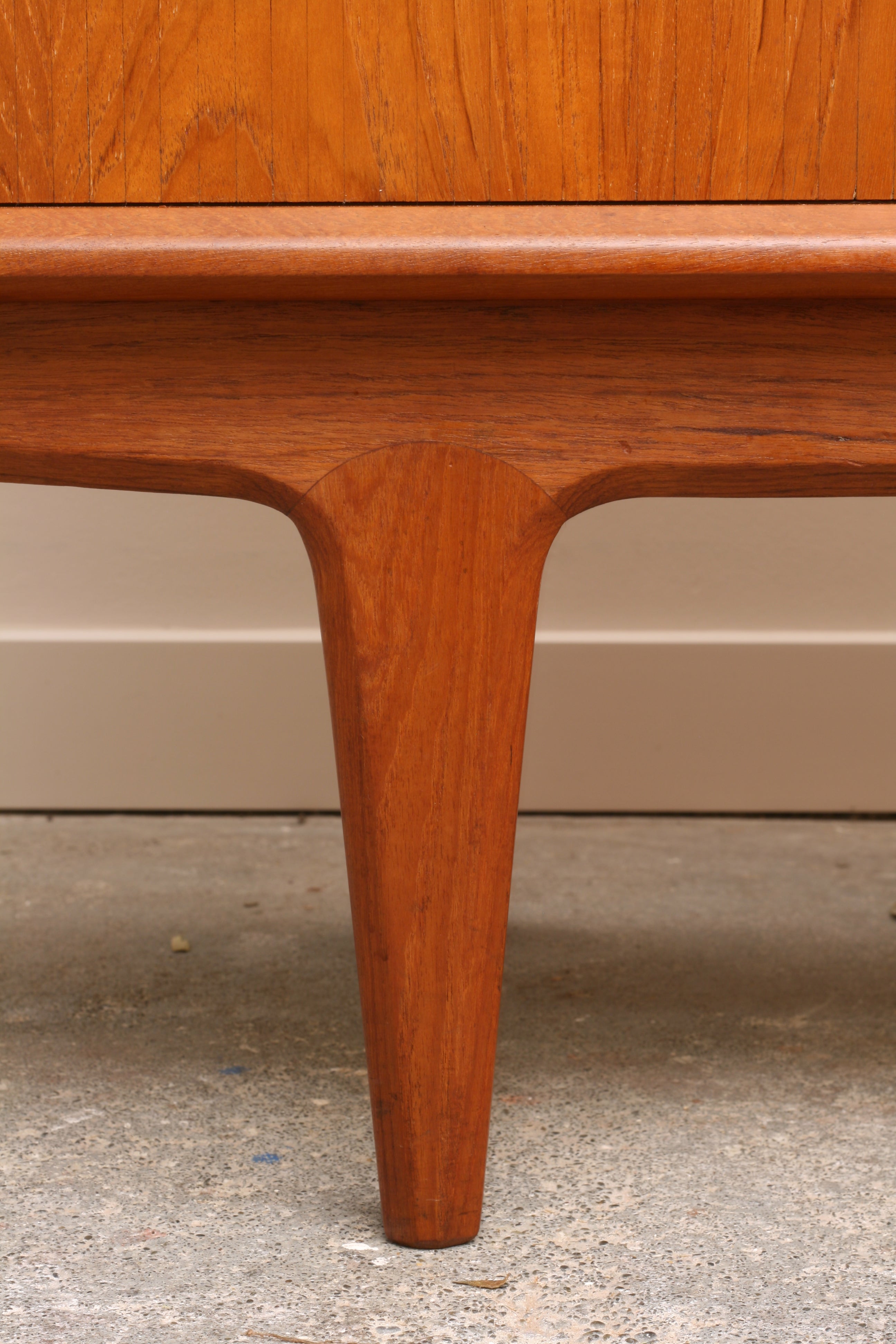 Danish Teak Tambour sideboard leg and inset curved joint detail.