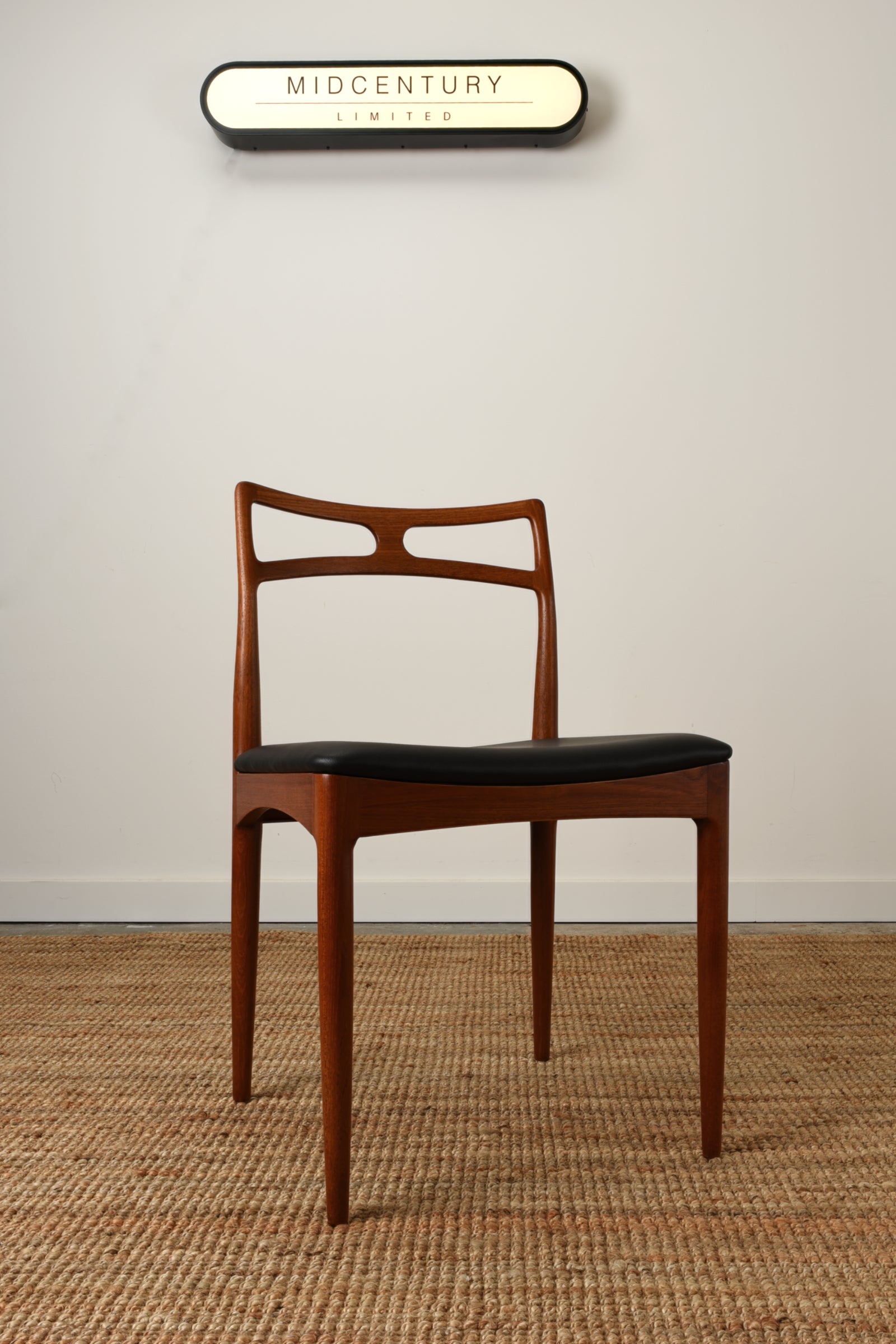 Johannes Andersen model 94 dining chair. Manufactured in Teak by Christian Linneberg.