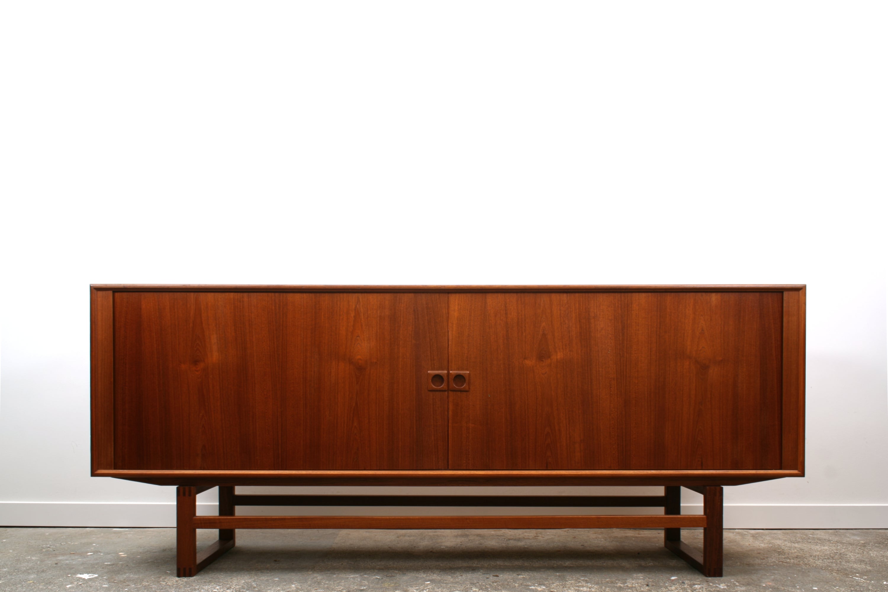 Danish Tambour sideboard by Axel Christensen Odder. Shown in Teak with doors closed.
