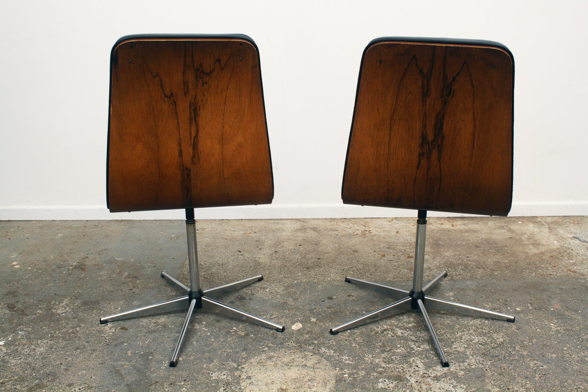 Rosewood Mid century swivel chairs  showing decorative rosewood backs.