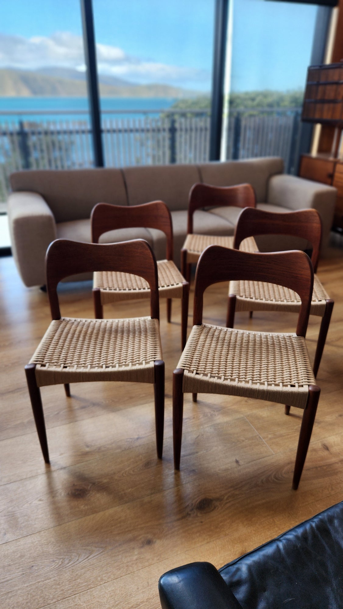 A set of eight Arne Hovmand-Olsen chairs by Mogens Kold (five shown). With newly weaved Danish cord.