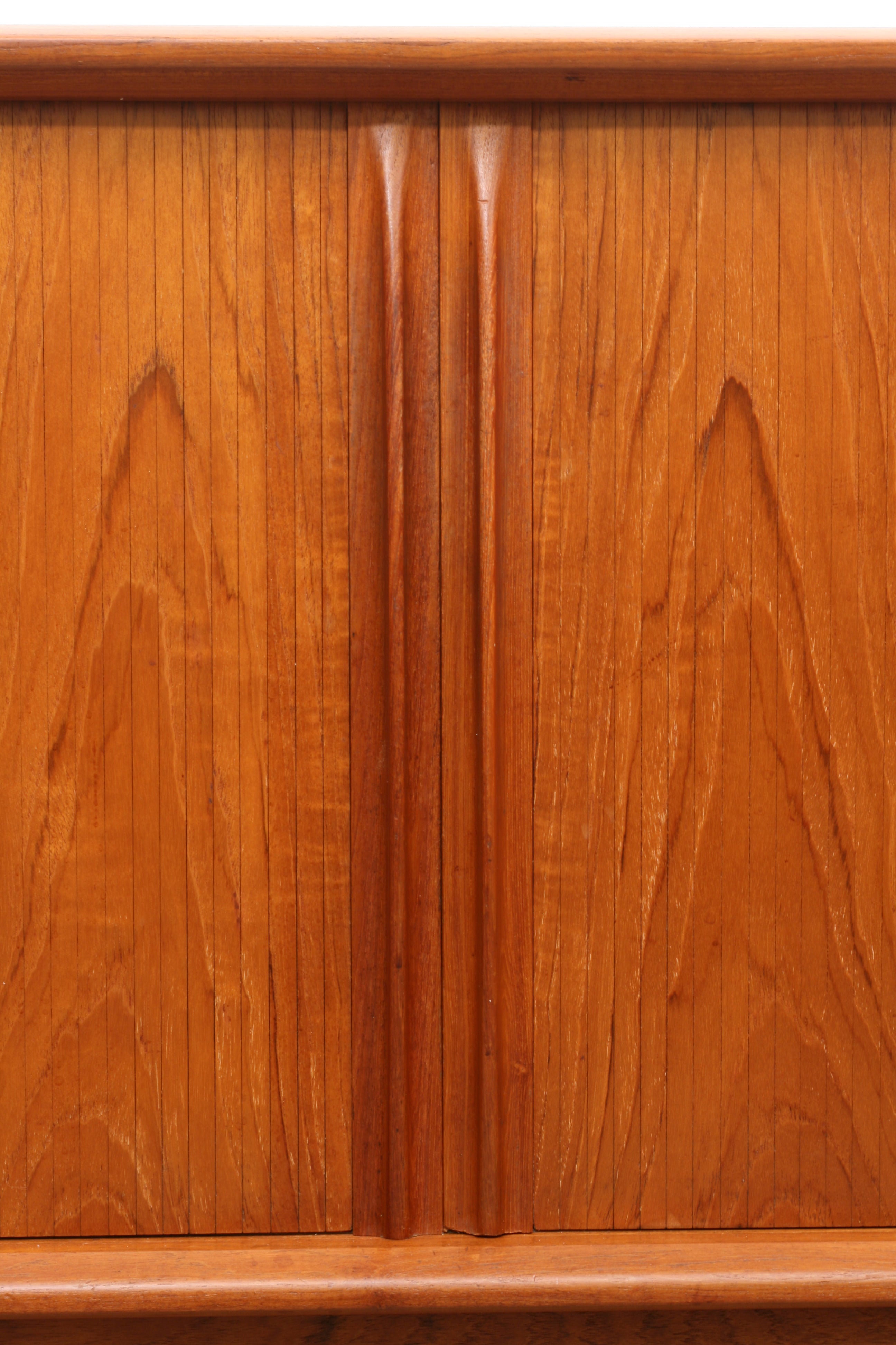 Danish Teak Tambour sideboard tambour door and sculpted handles.