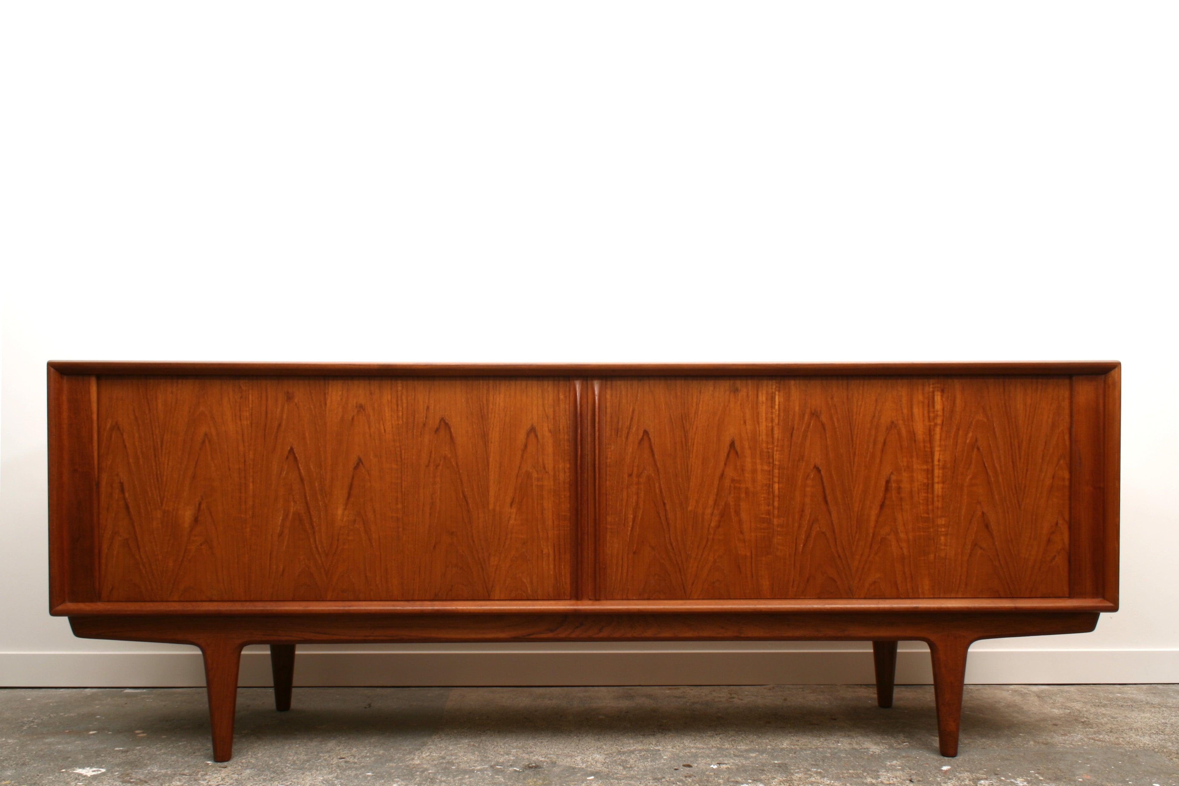Bernhard Pedersen & Son Danish Teak Tambour sideboard. Front view showing flame teak veneer grain.