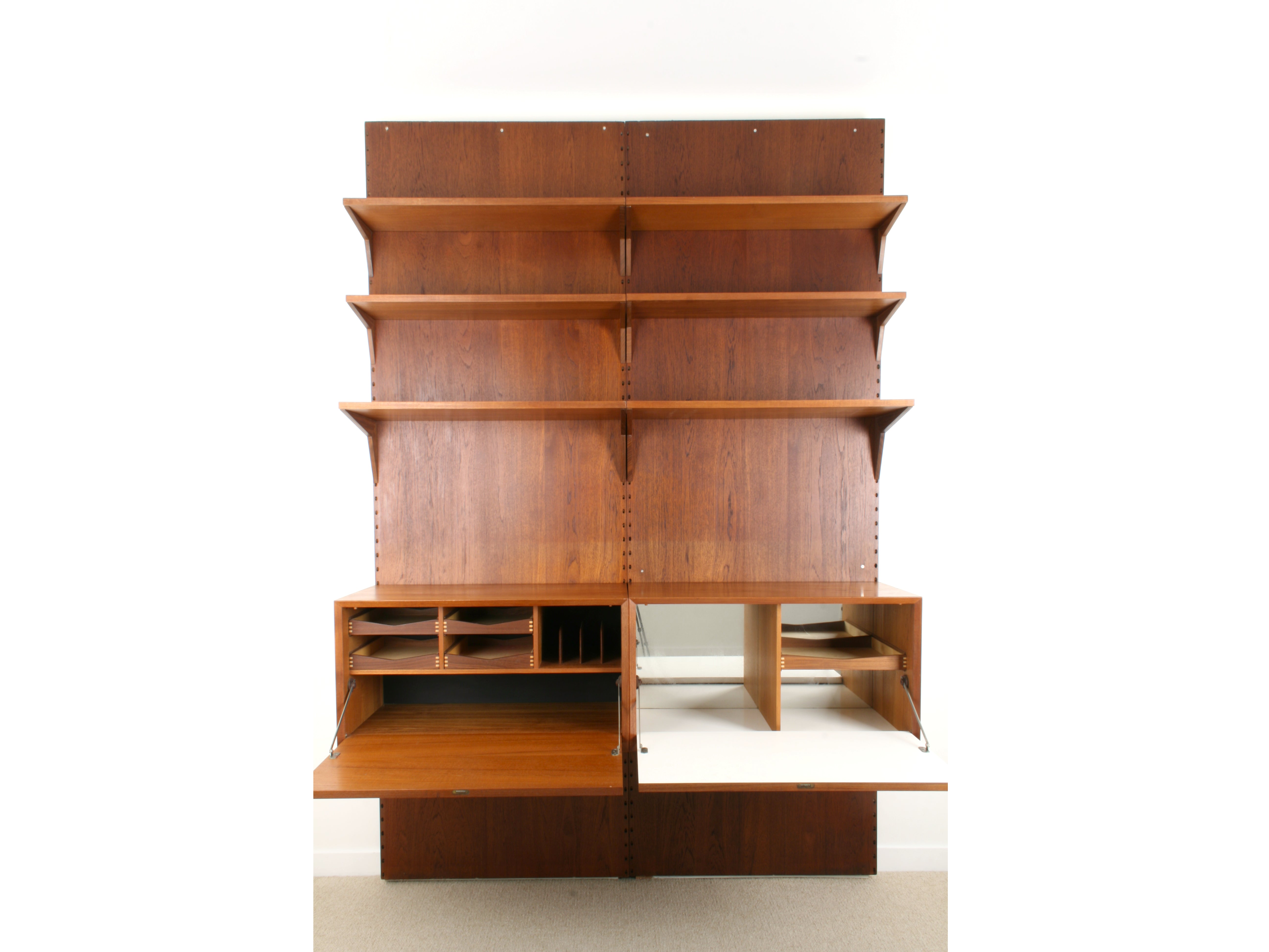 Danish Teak Cadovius system with cabinet doors open.