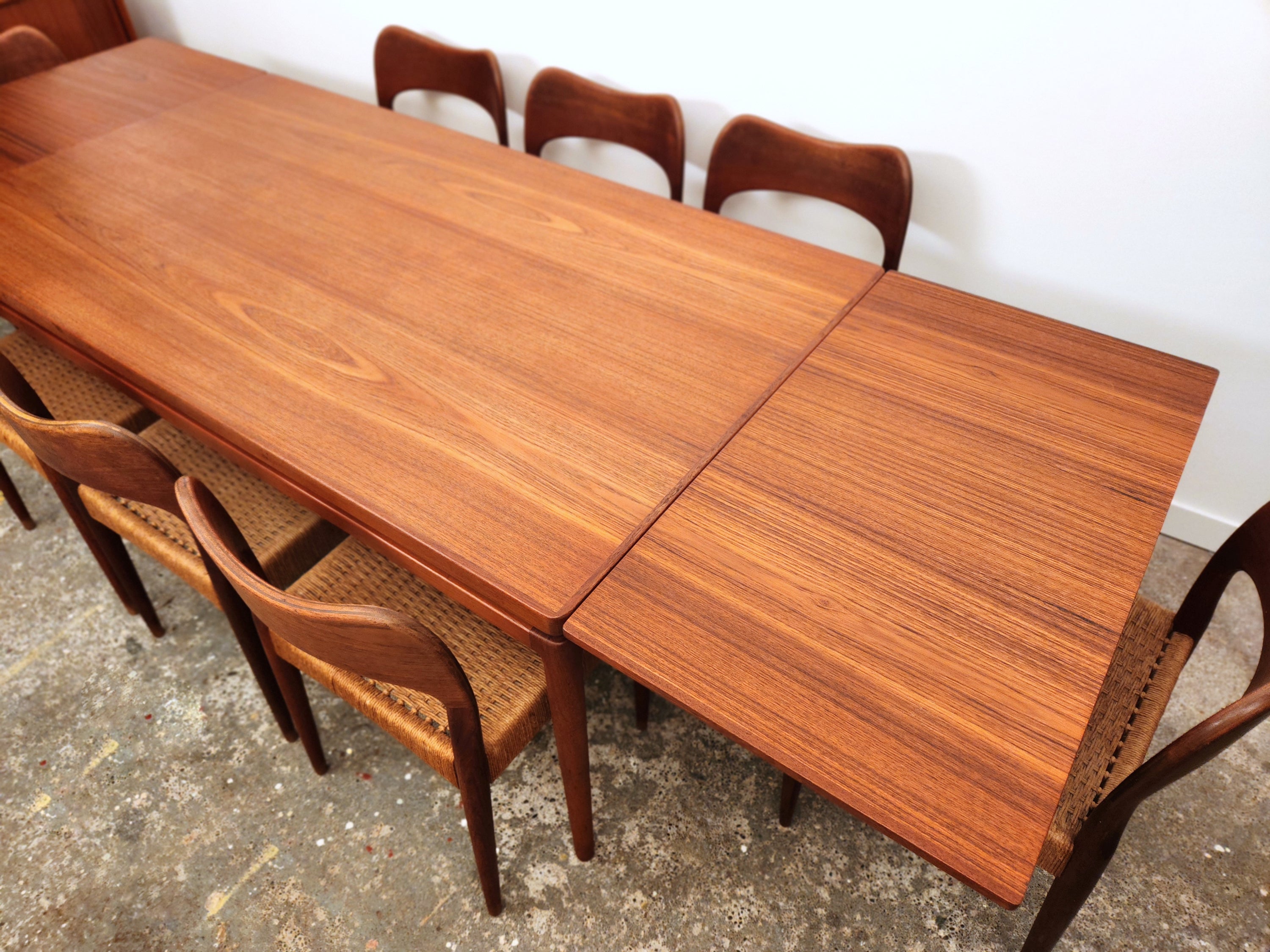 A Danish dining table manufactured by Christian Linneberg and designed by Johannes Andersen