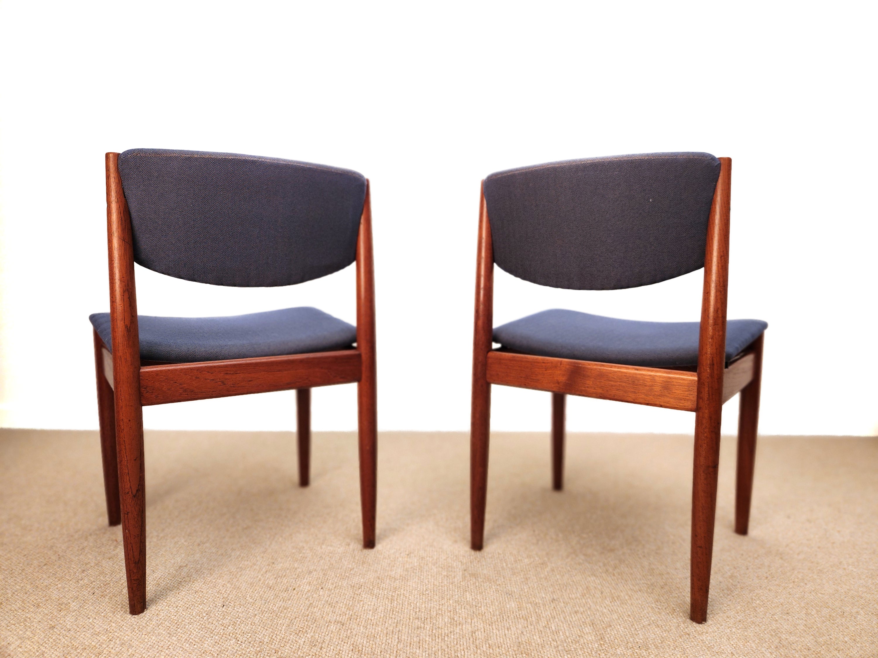 Danish modern dining chairs. Pair from the rear.