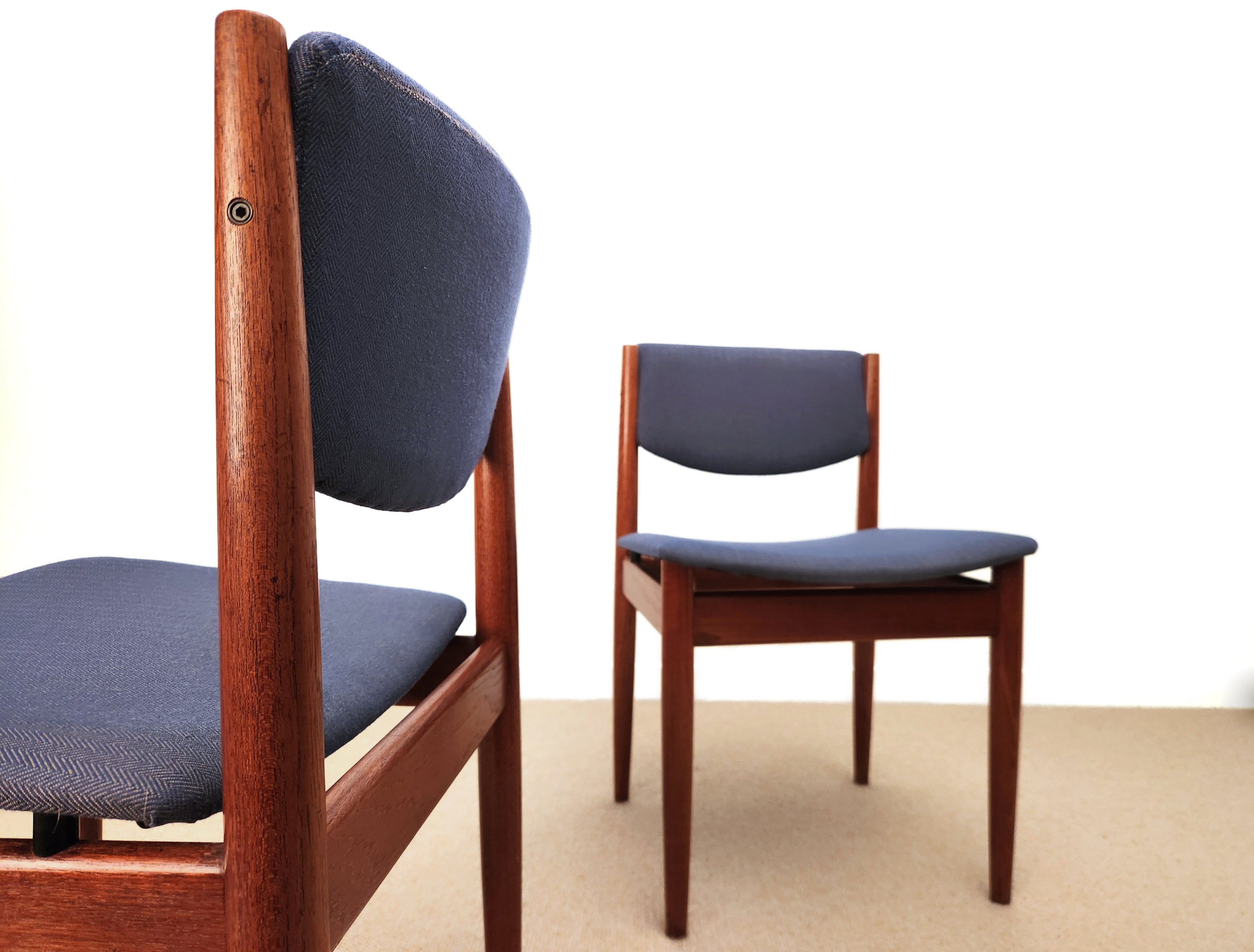 Danish modern dining chairs. Solid teak tapered legs.