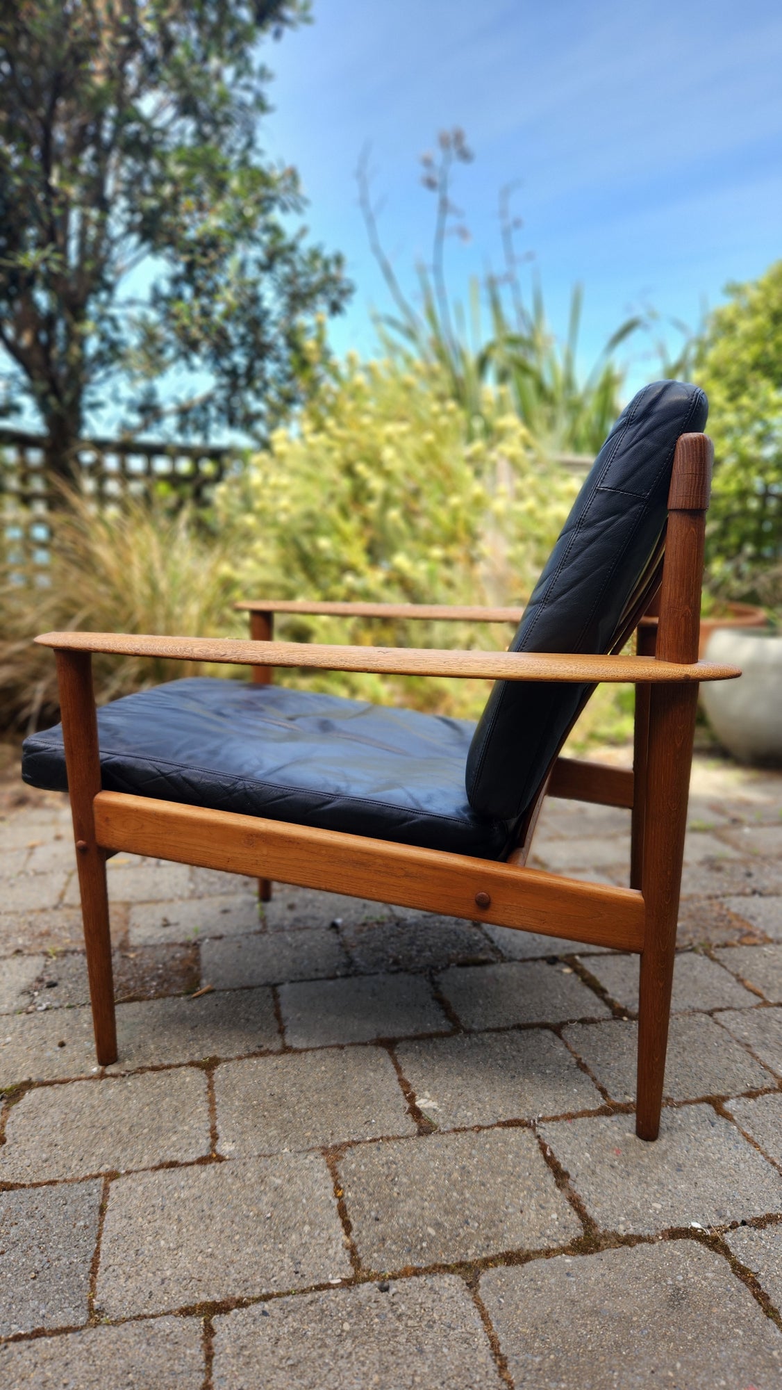 Grete Jalk PJ56 armchair in Oak. Side profile.