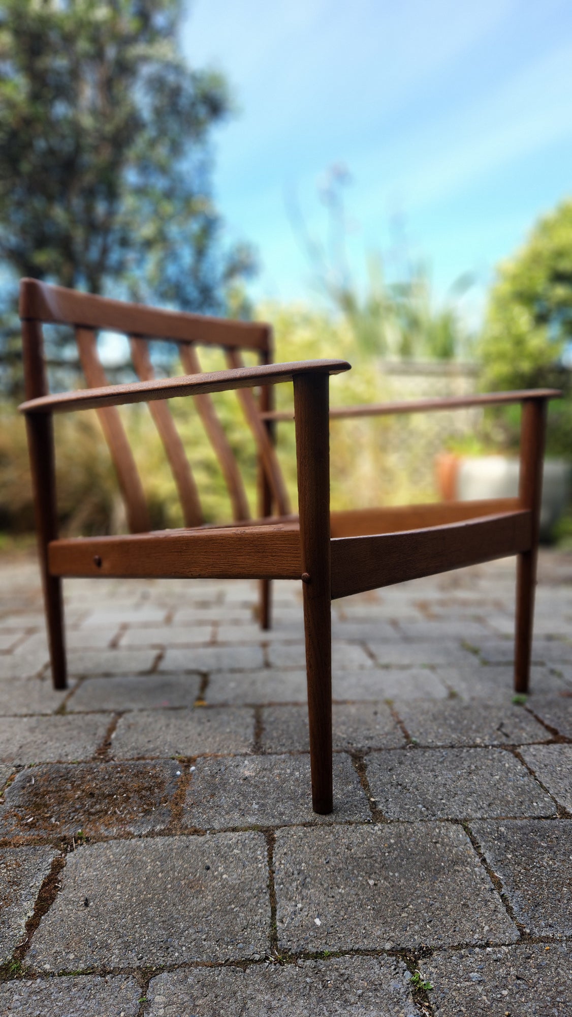 Grete Jalk PJ56 armchair in Oak. front profile.