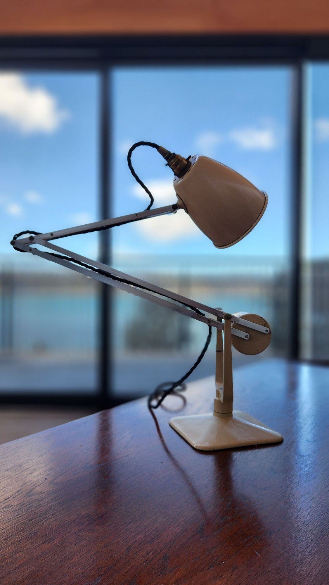Cream coloured anglepoise lamp by Hadrill and Horstmann. Compressed position
