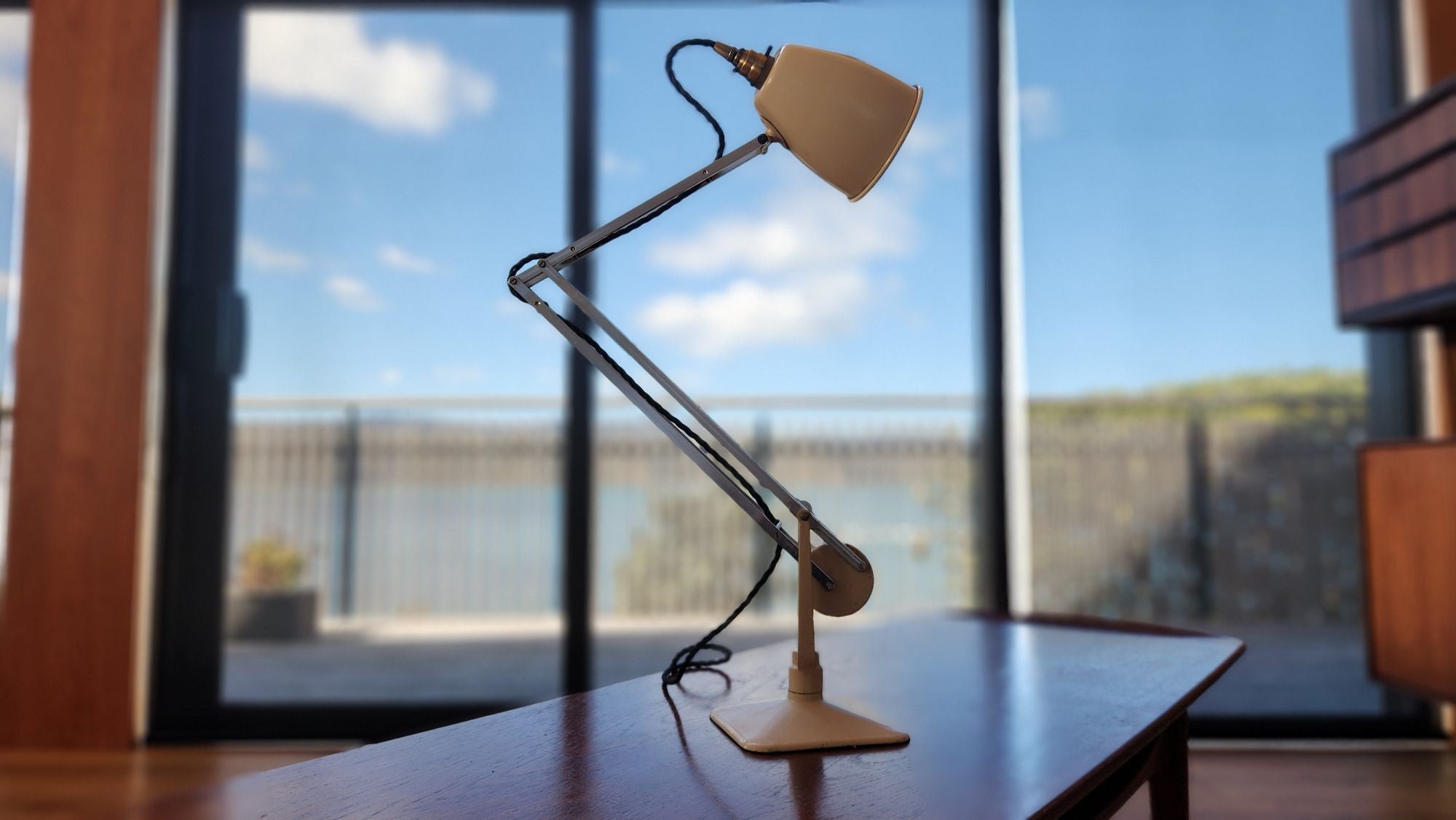 Cream coloured anglepoise lamp by Hadrill and Horstmann. Extended height position.