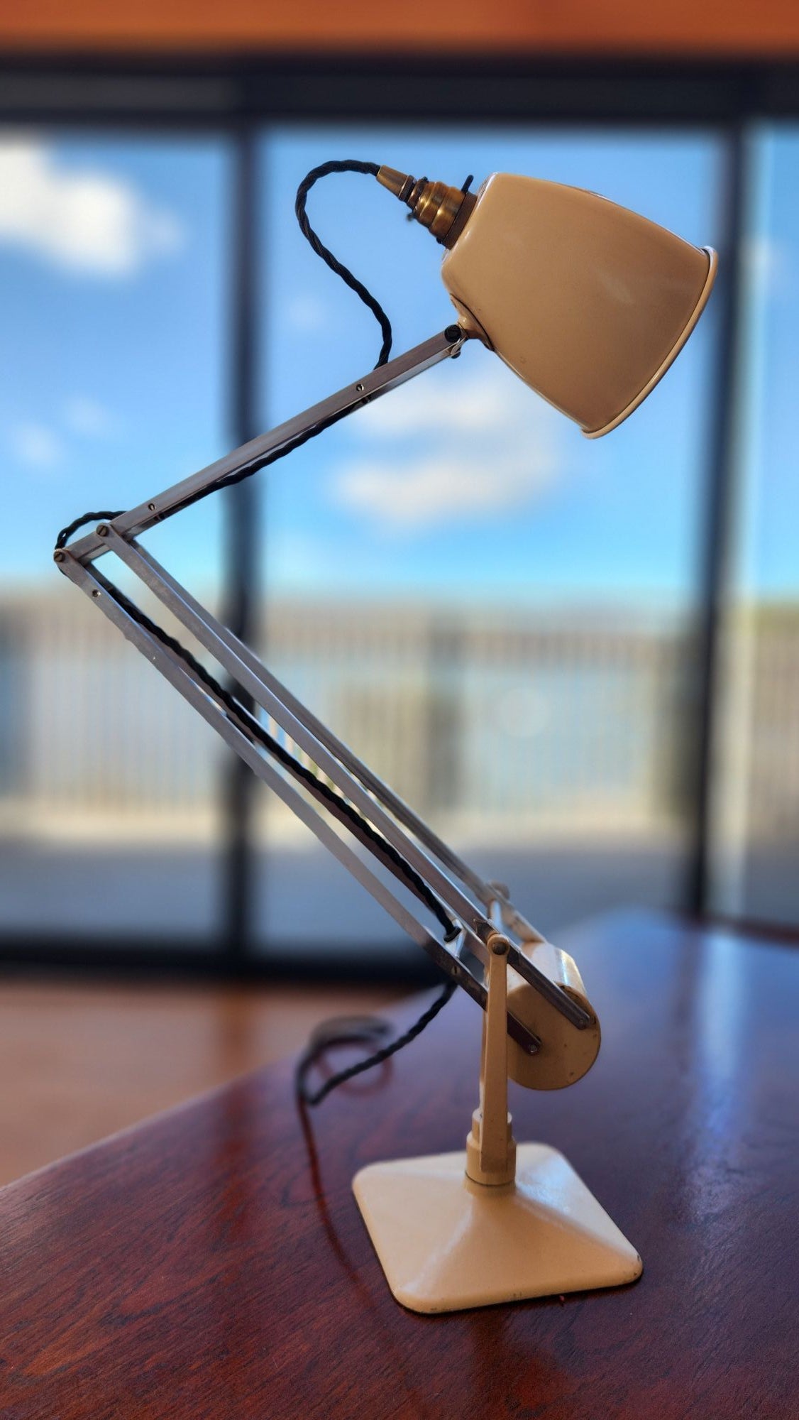 Cream coloured anglepoise lamp by Hadrill and Horstmann. 