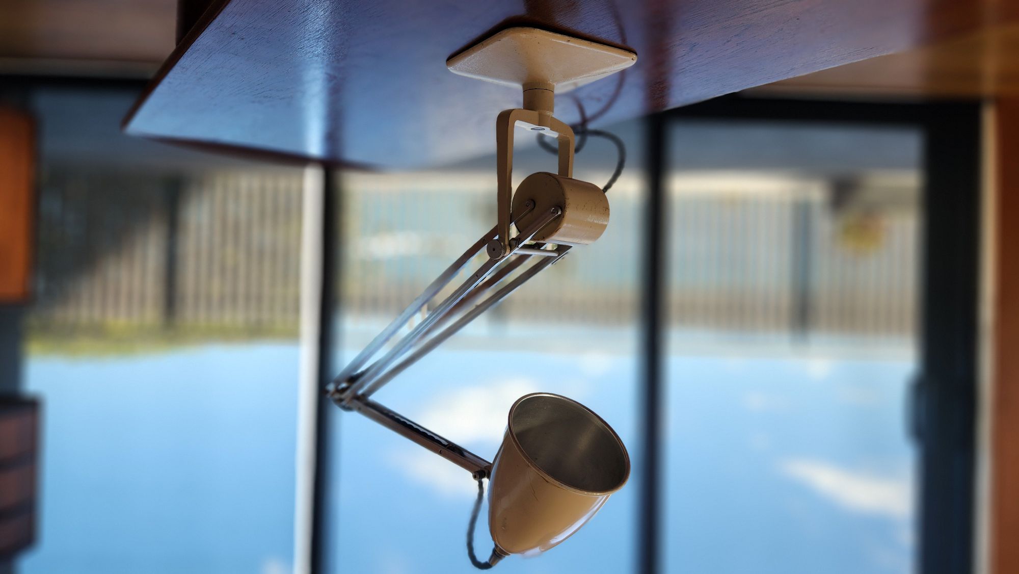 Cream coloured anglepoise lamp by Hadrill and Horstmann. Front view