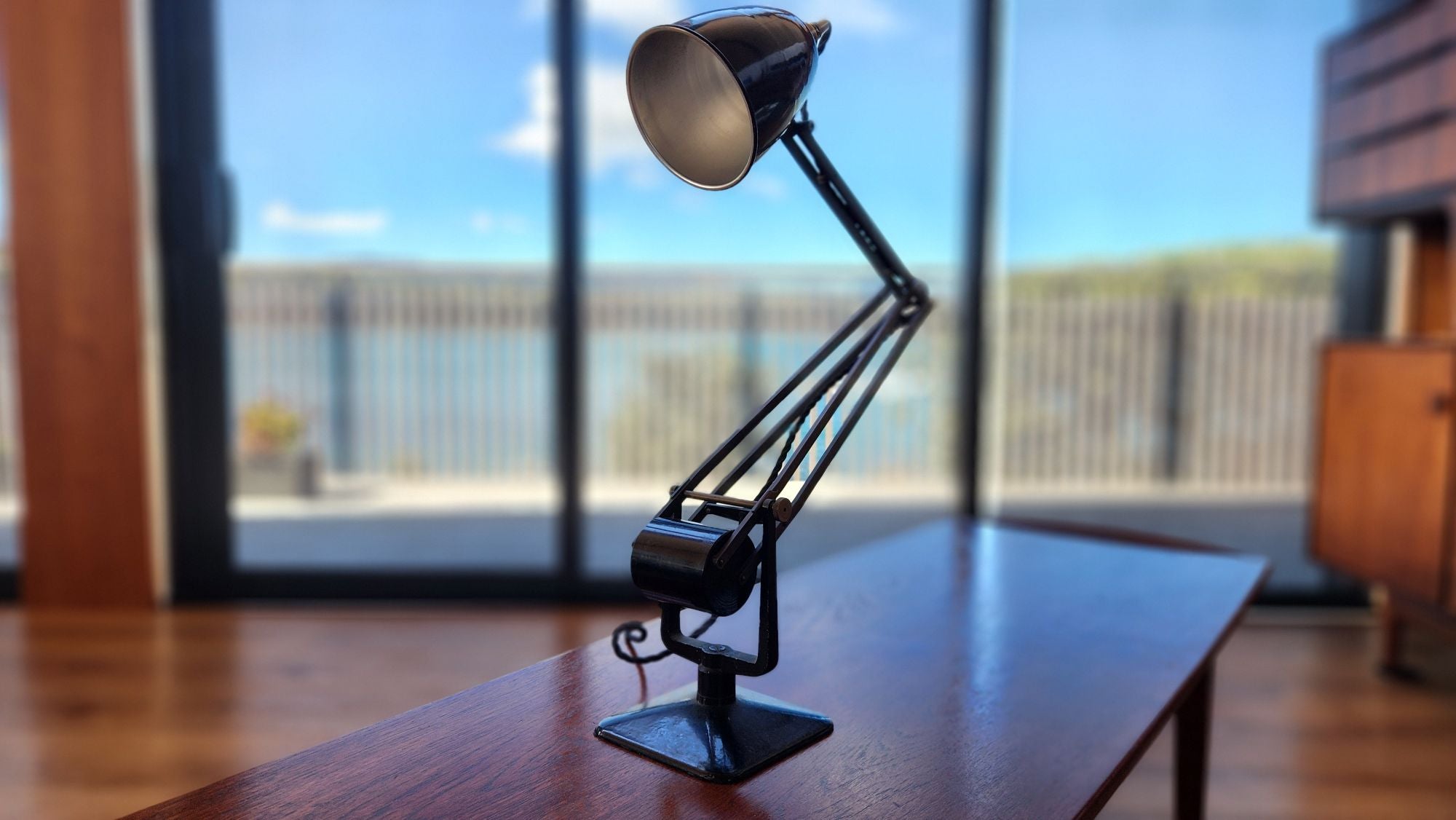 Black old Hadrill and Horstmann anglepoise lamp. front view