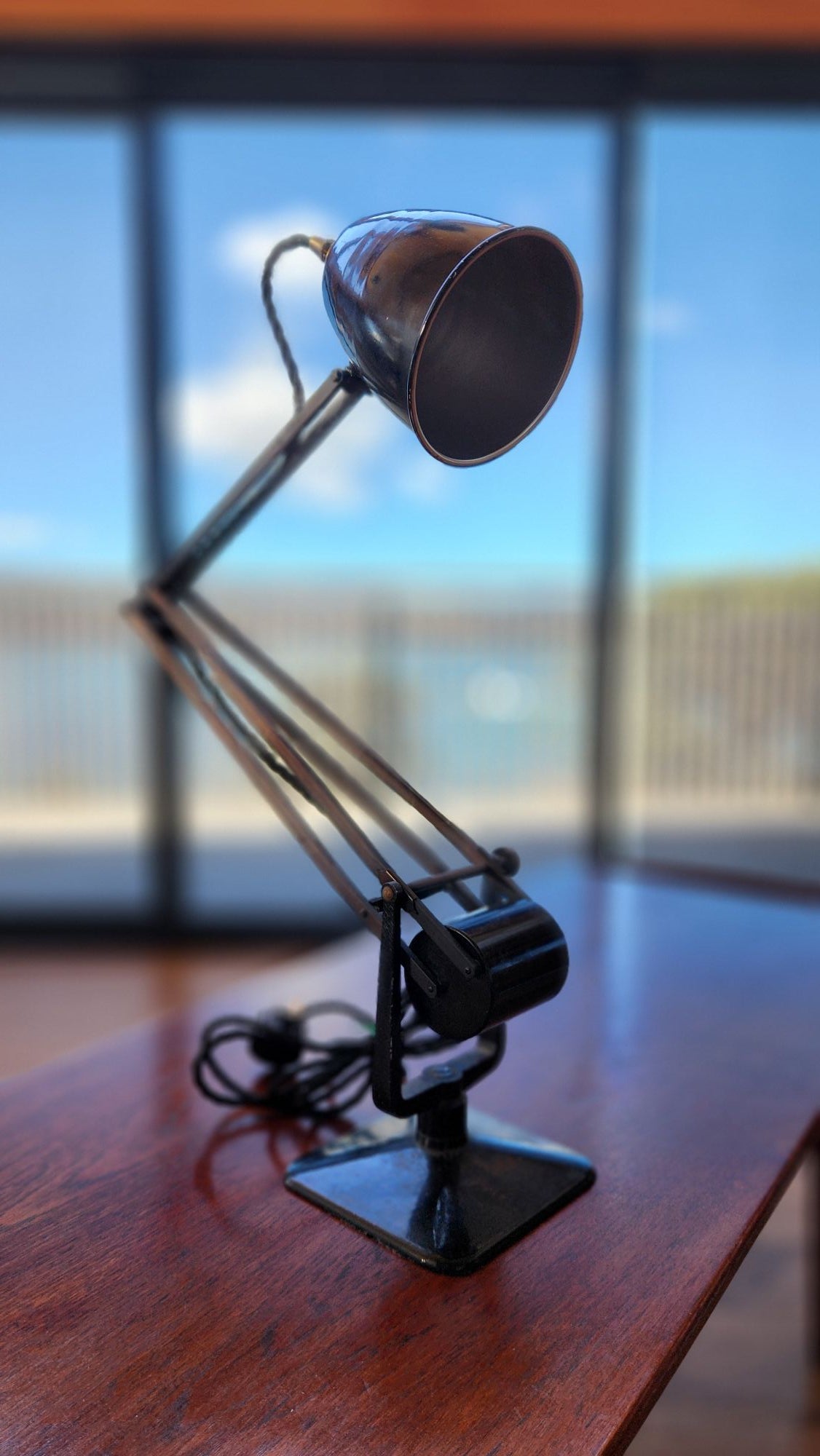 Black old Hadrill and Horstmann anglepoise lamp. front view