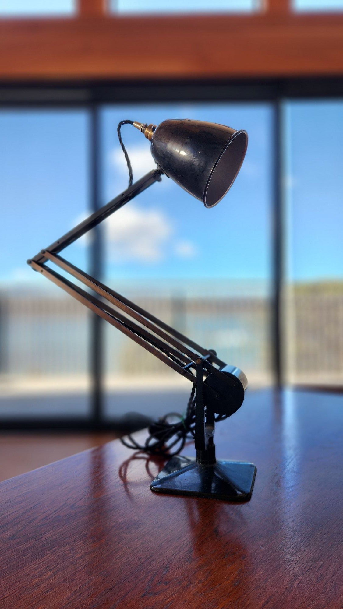 Black old Hadrill and Horstmann anglepoise lamp. side view