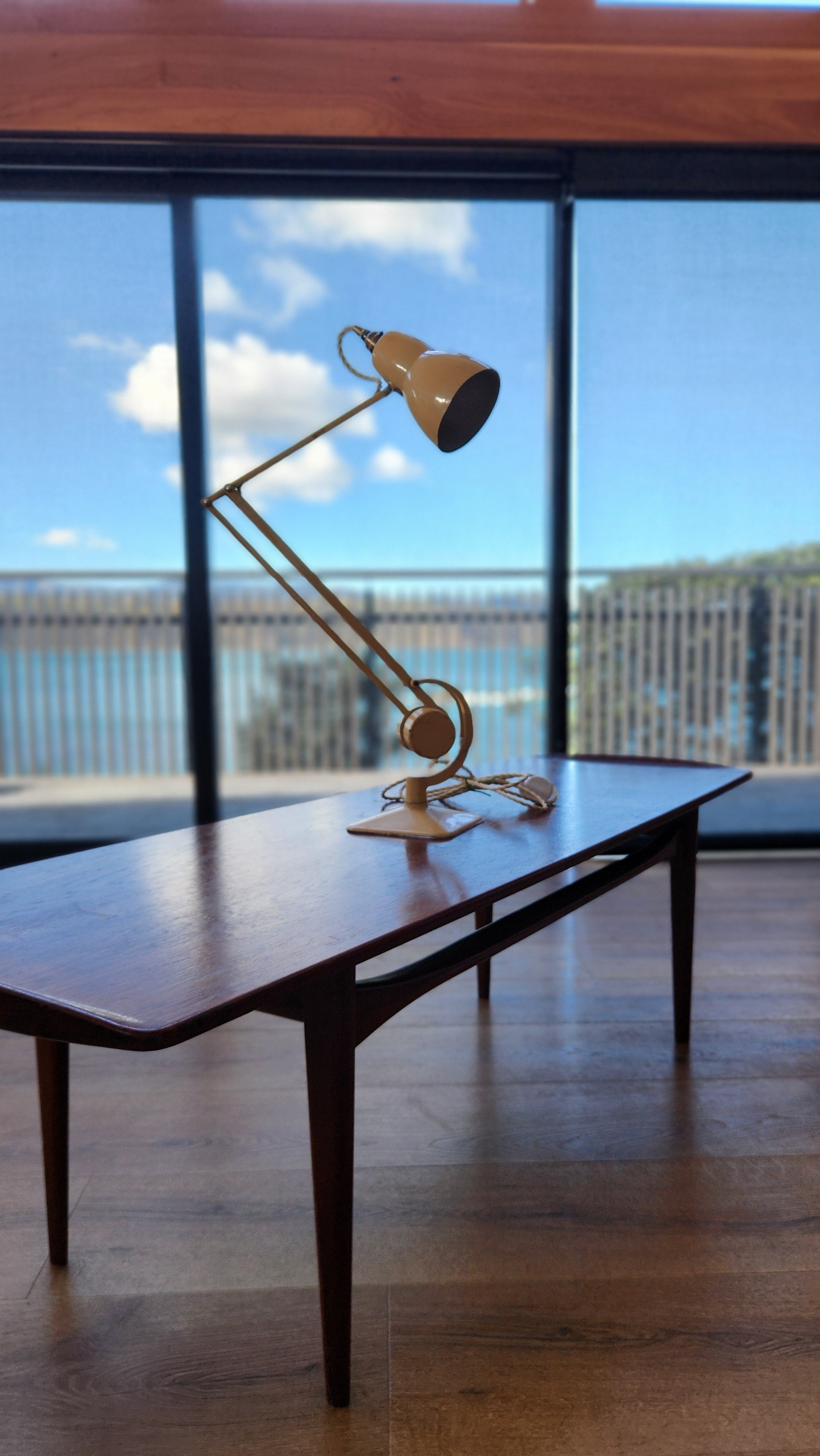 Hadrill Horstmann lamp sitting on a Hvidt coffee table