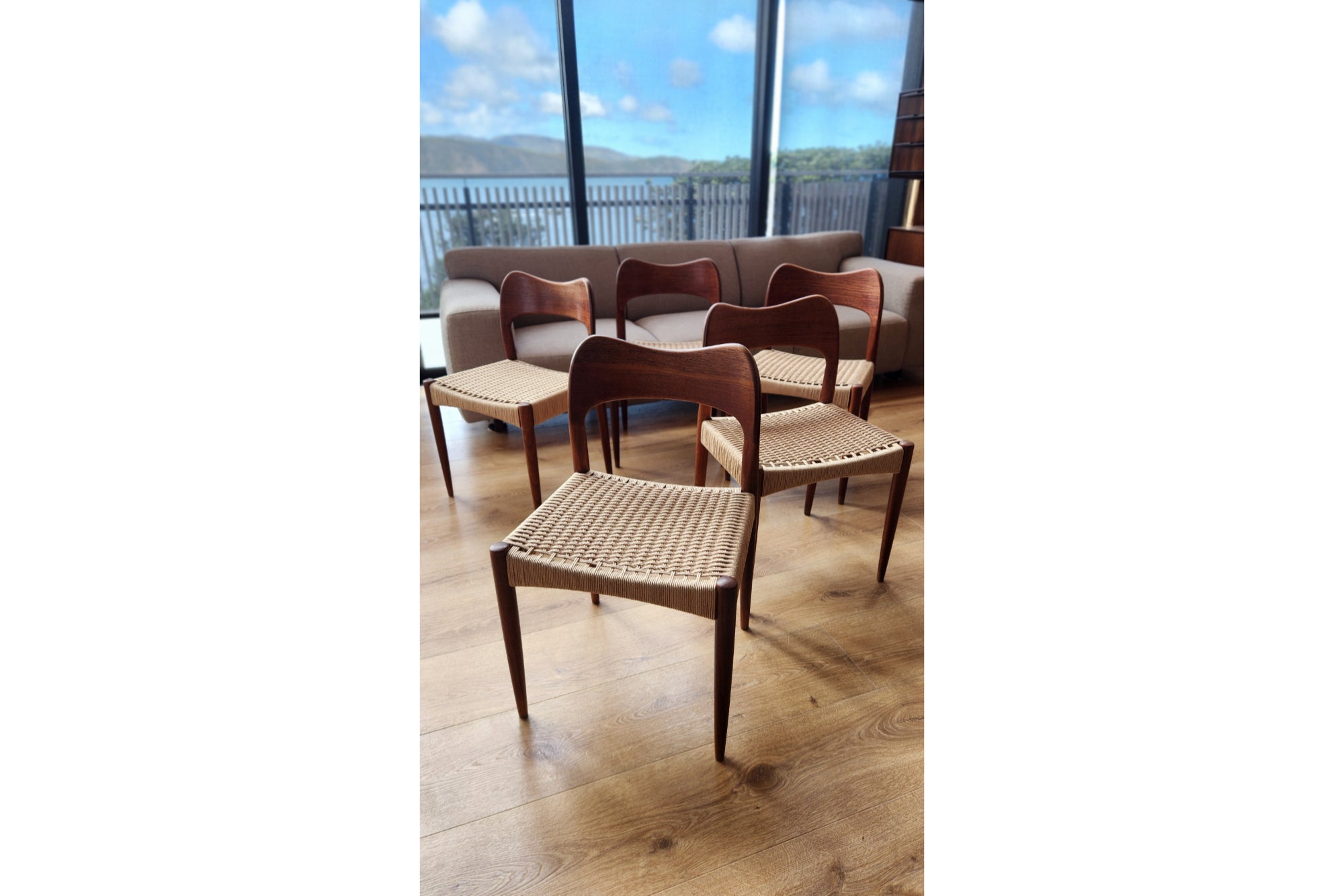 A set of eight Arne Hovmand-Olsen chairs by Mogens Kold (five shown). With newly weaved Danish cord.