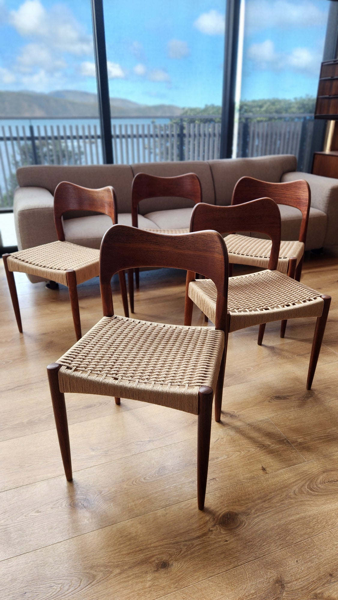 A set of eight Arne Hovmand-Olsen chairs by Mogens Kold (five shown). With newly weaved Danish cord.
