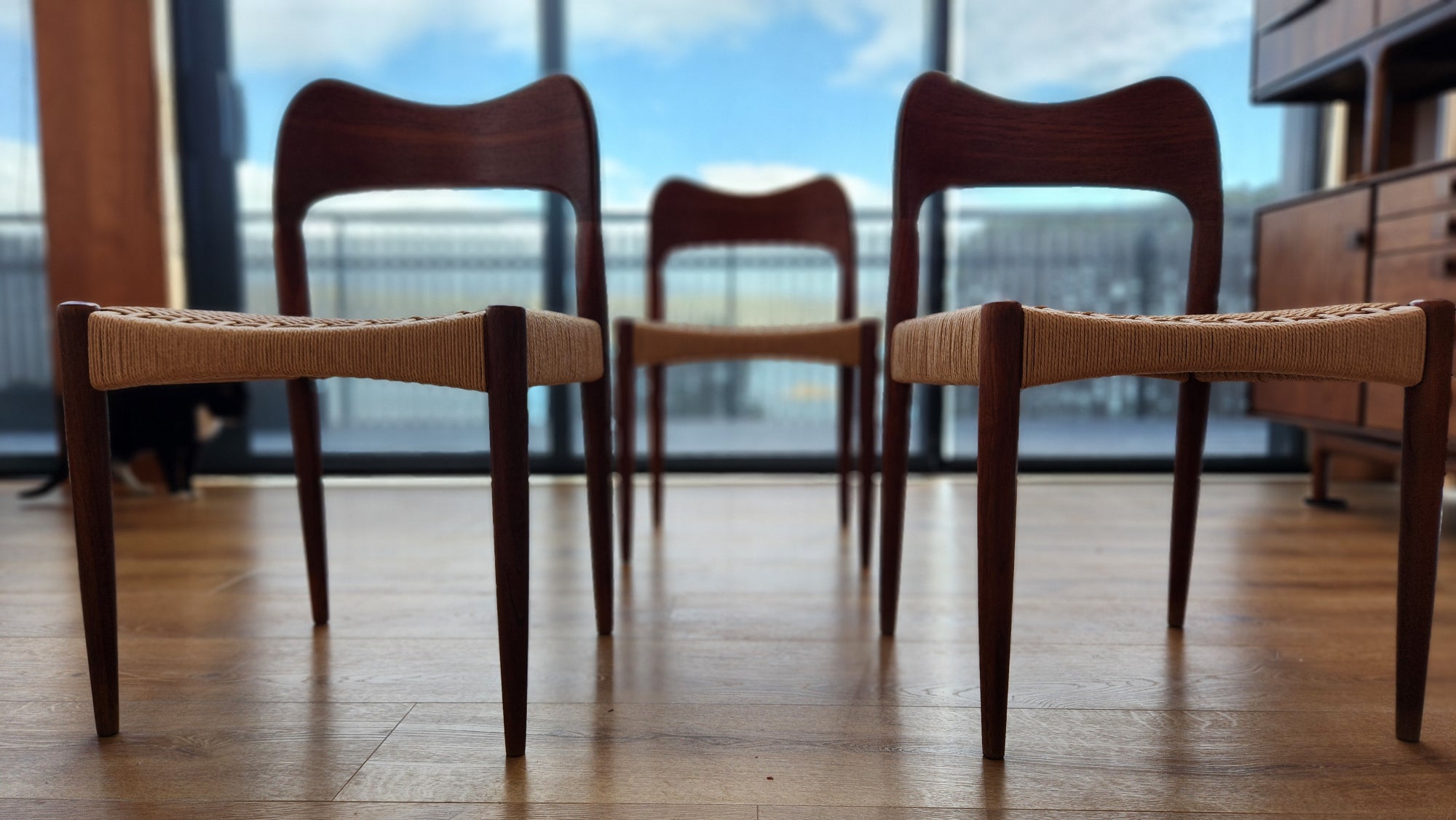 Arne Hovmand Olsen Danish chairs. Made of Teak and with Danish woven cord seats.