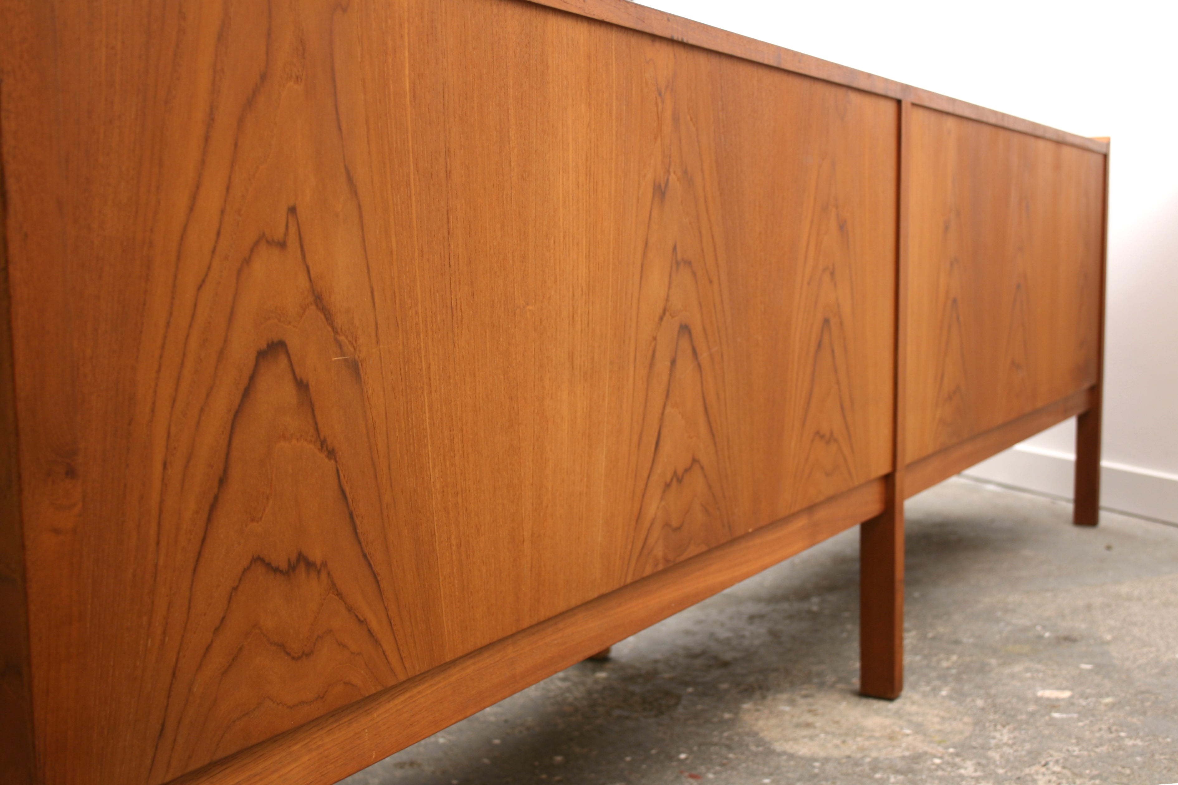 Mid Century sideboard with even a good quality decorative veneered rear. 