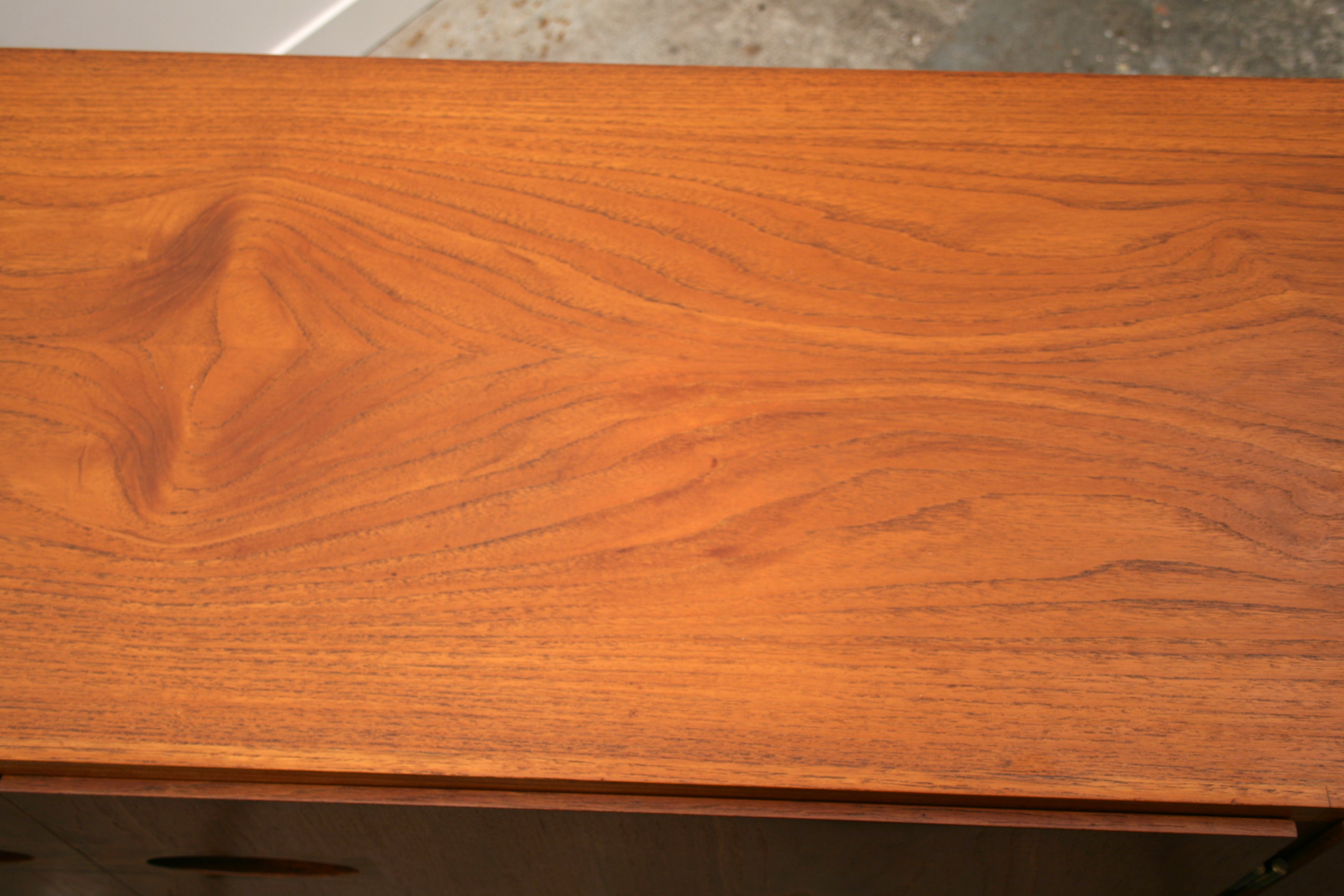 Mid Century sideboard close up of top detail middle left.