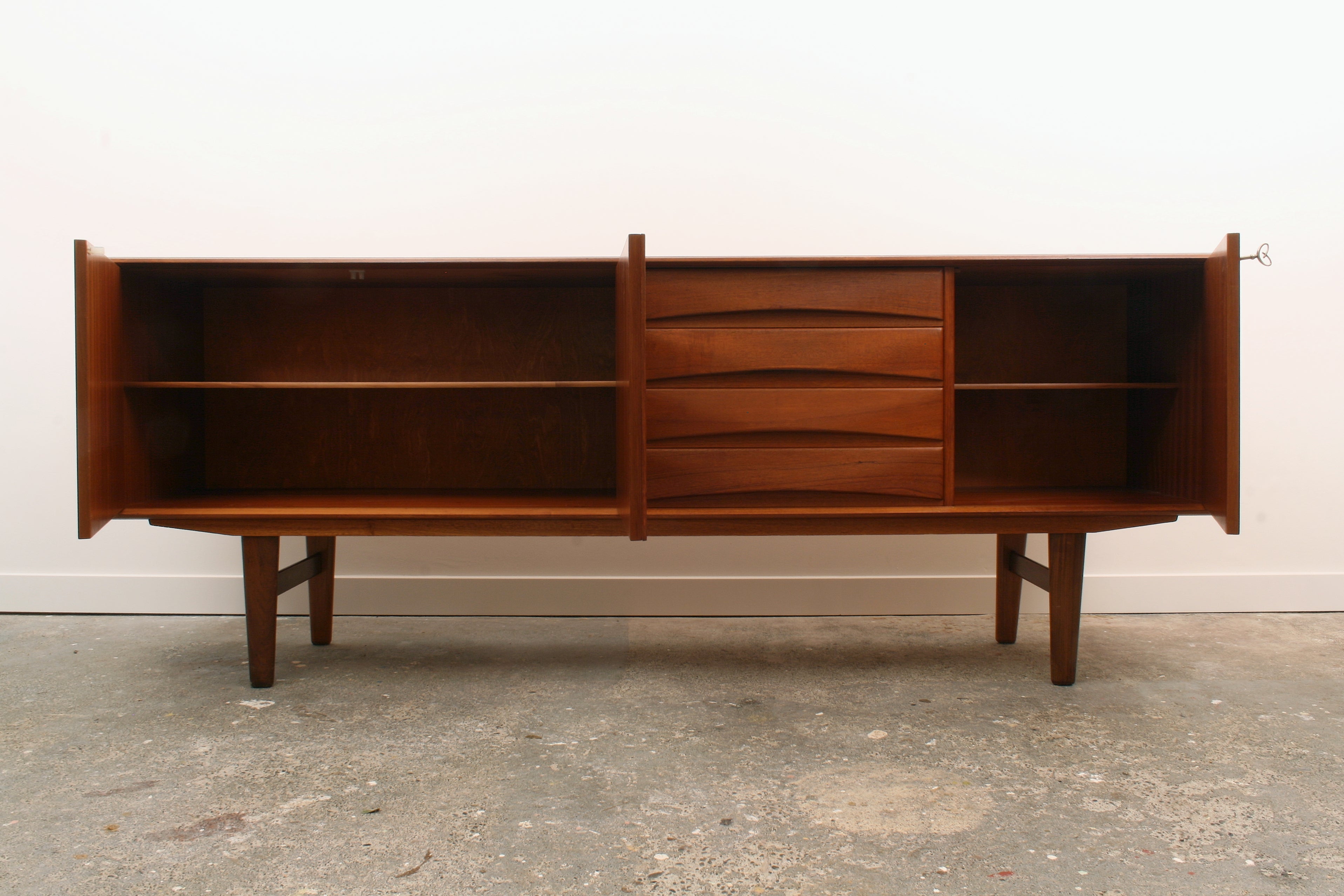 Norwegian teak sideboard front view with doors open.