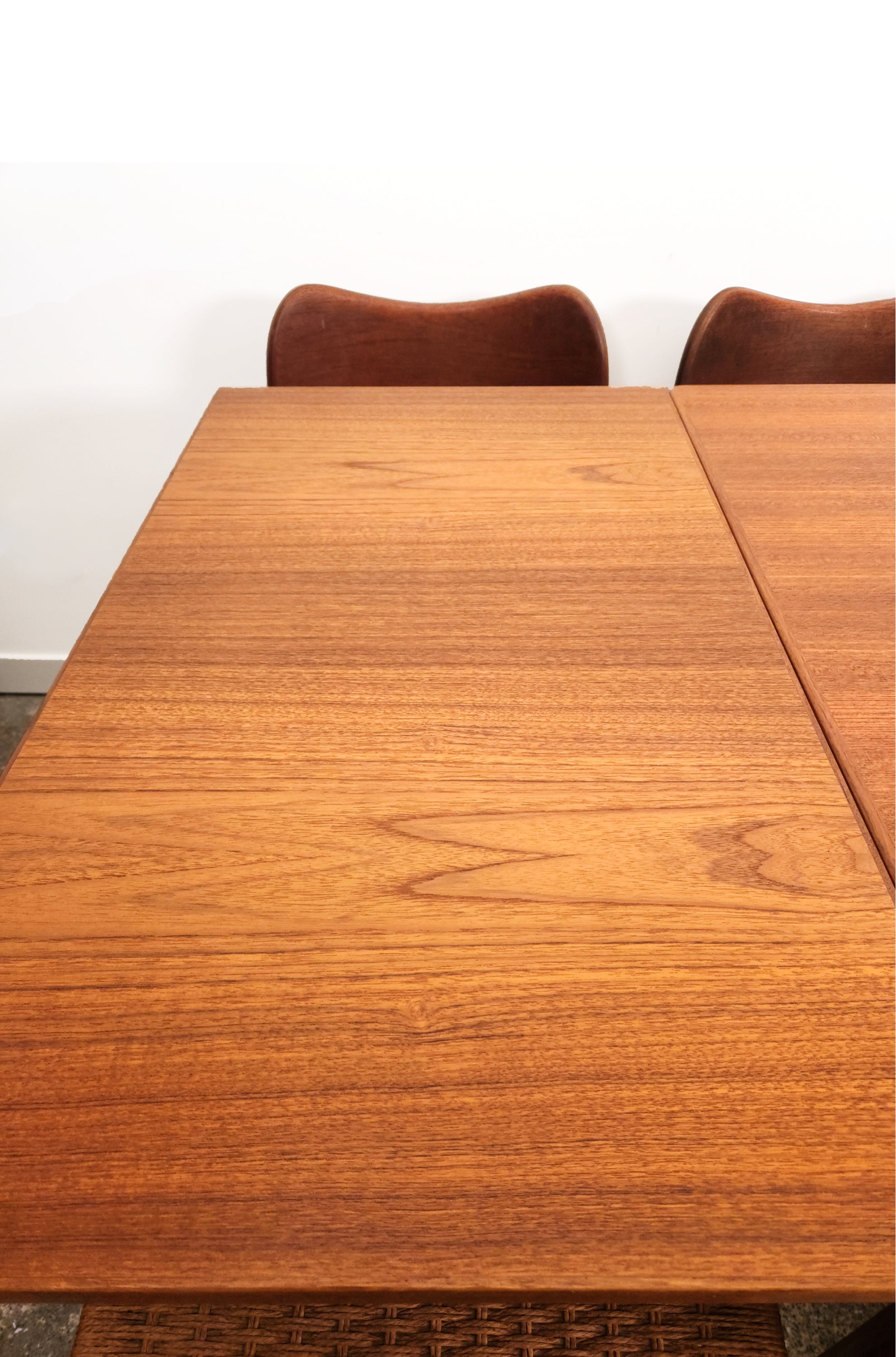 Henning Kjaernulf Danish Dining Table. Viewed from above left extension.