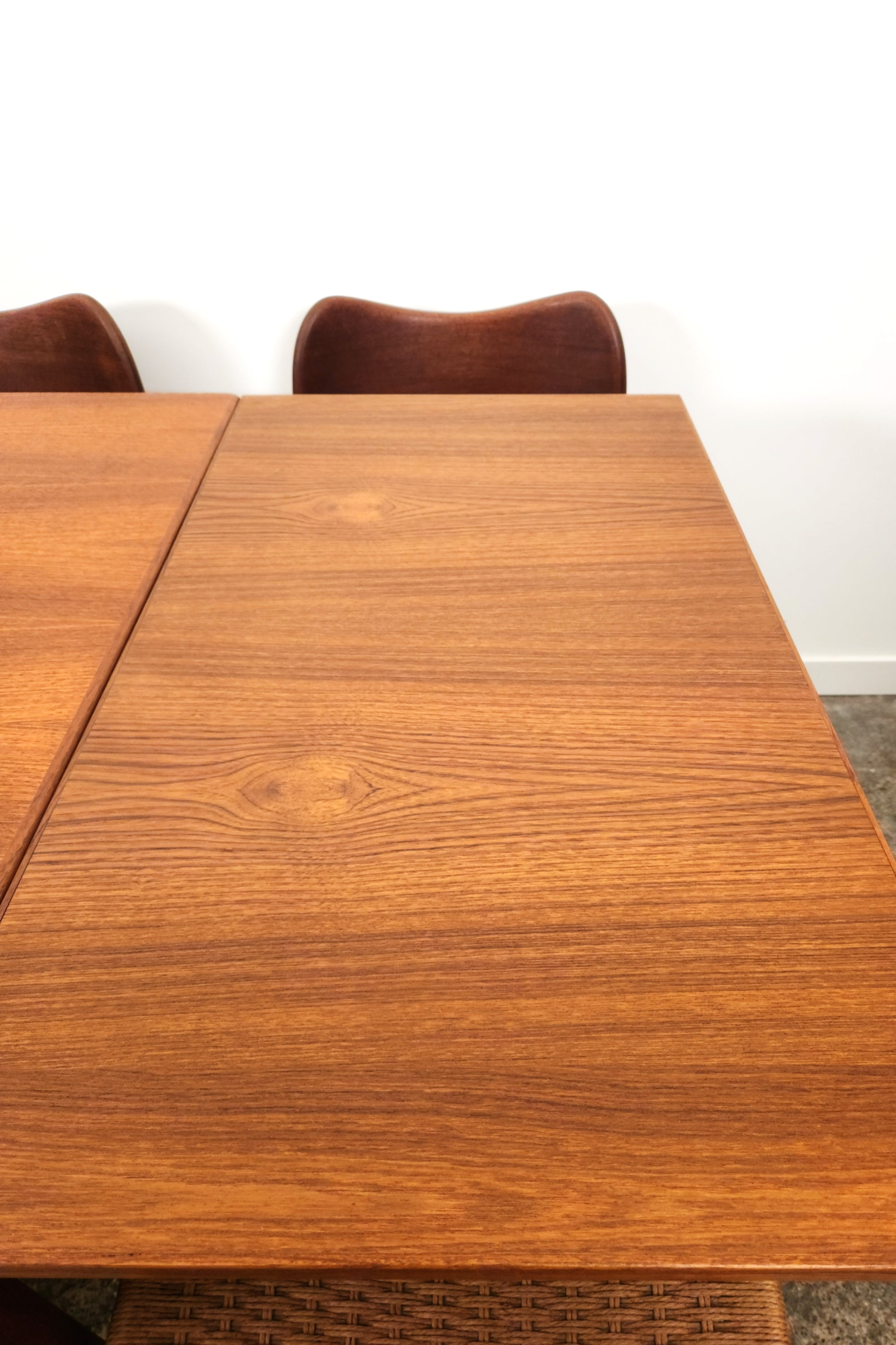 Henning Kjaernulf Danish Dining Table. Viewed from above right extension.