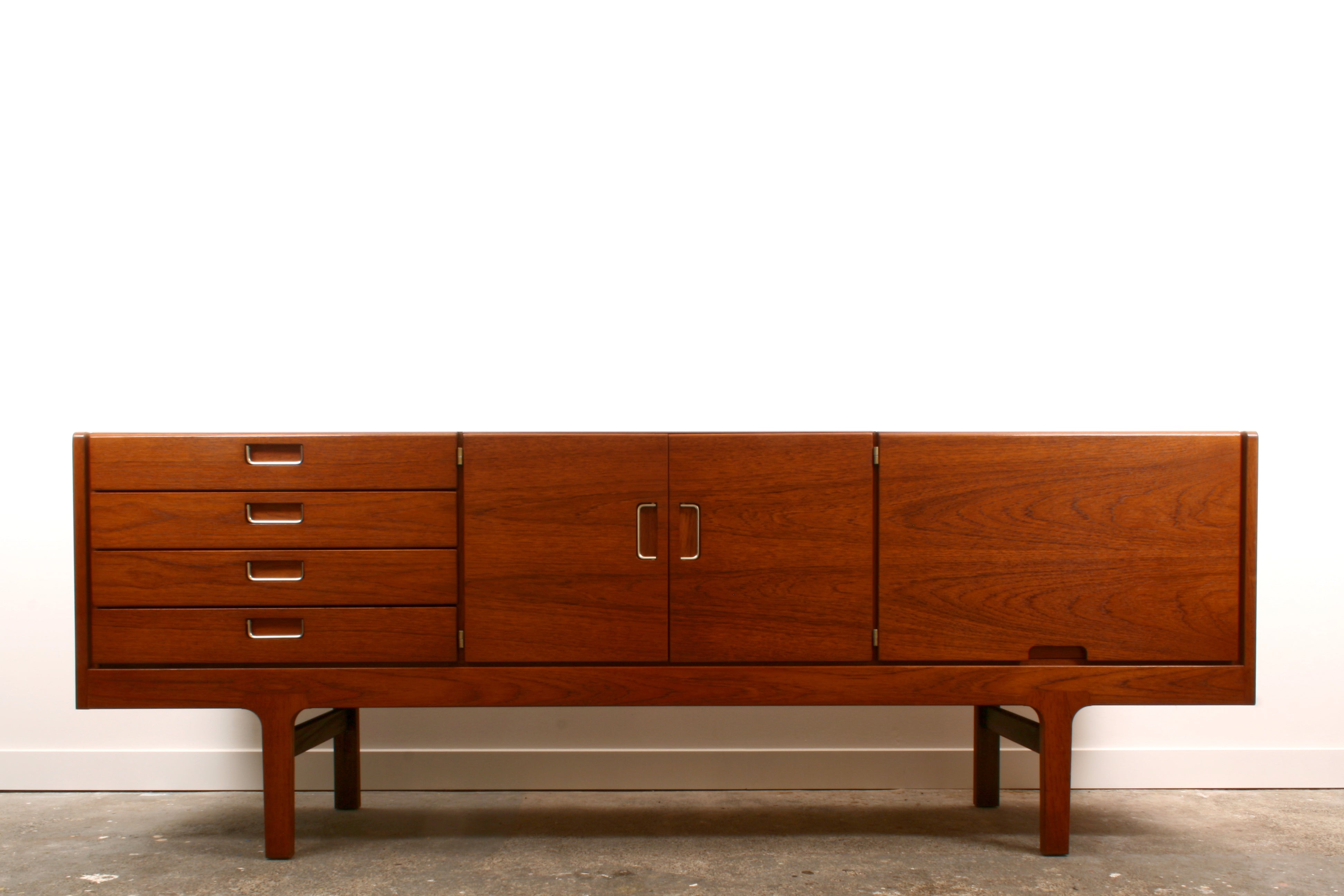 Meredew Mid Century Teak Sideboard with decorative veneer along its length.