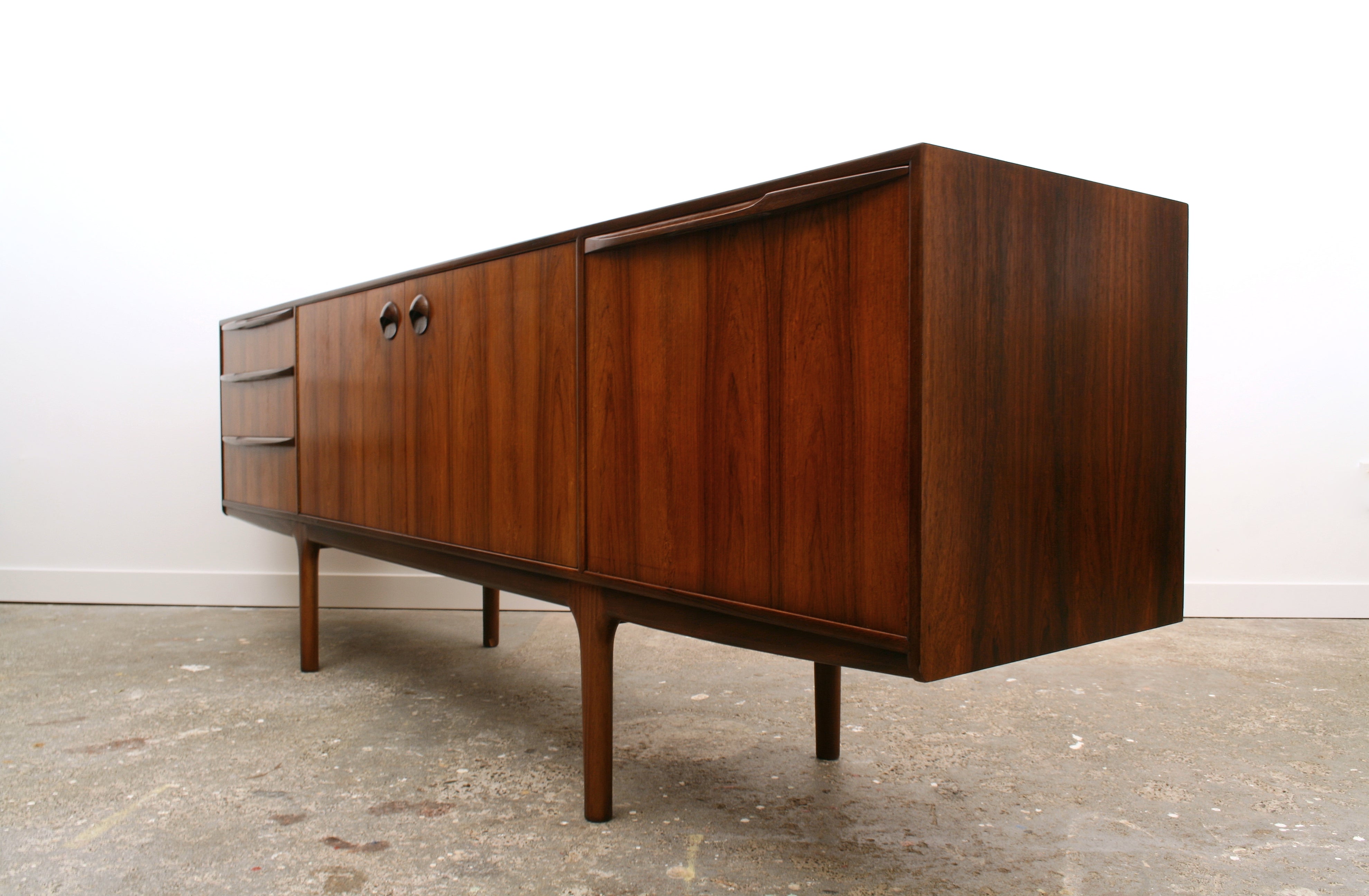 McIntosh Rosewood sideboard highlighting the figurative veneer and the handle detailing. 