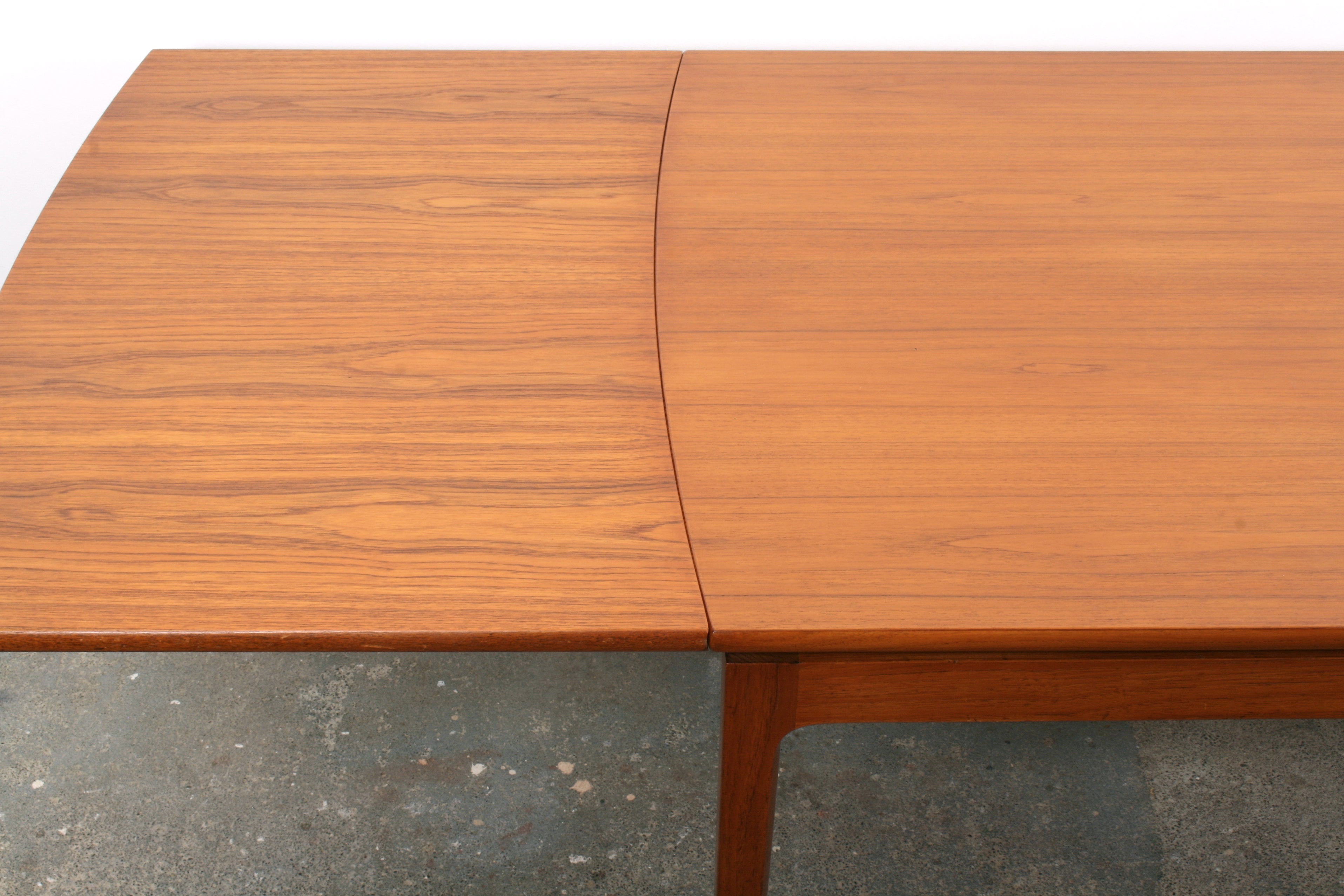 Mid Century Teak Dining Table by Ole Wanscher for France & Son showing left extension.