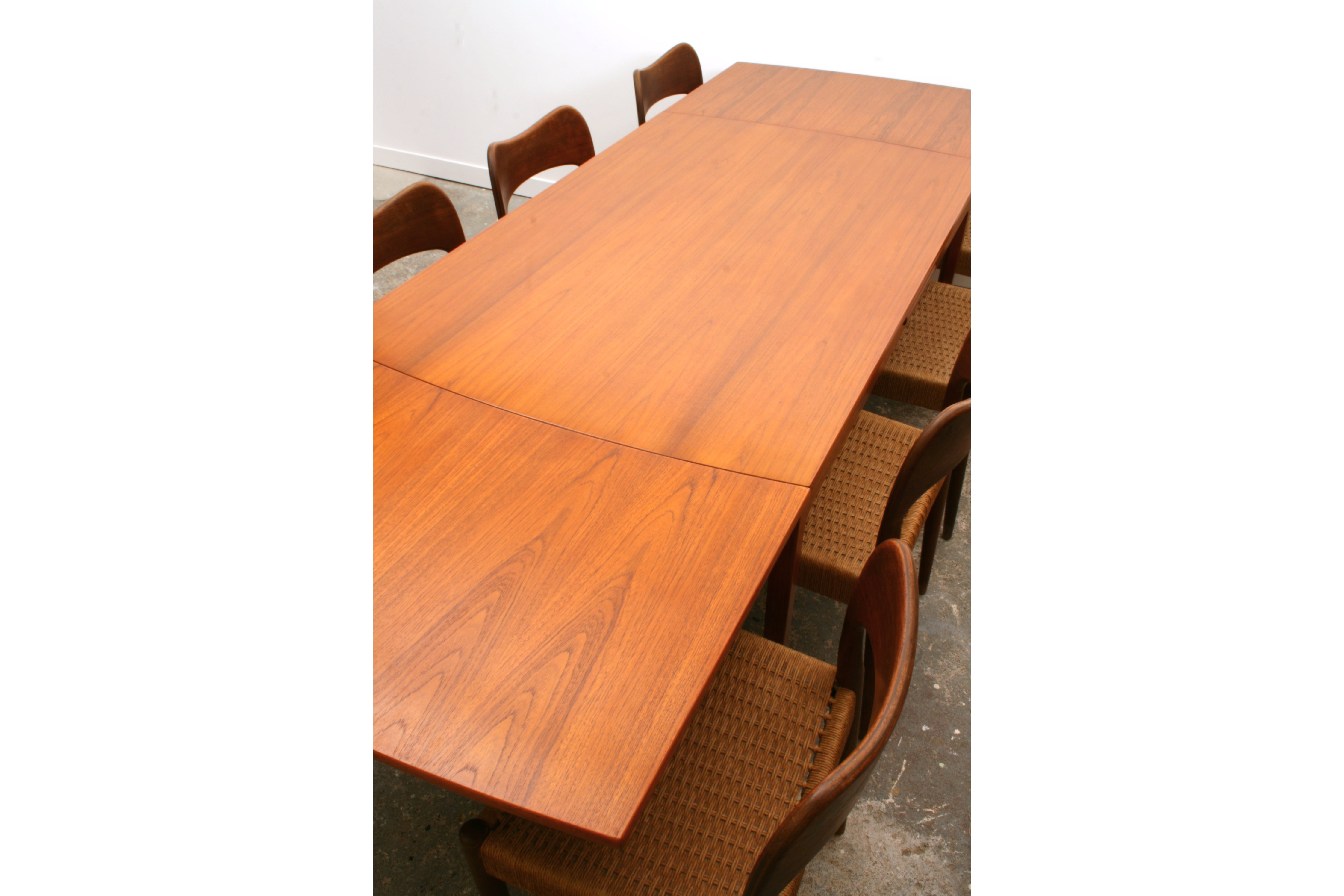 Danish Dining Table by Ole Wanscher for France & Son. Shown extended seating 8 chairs.
